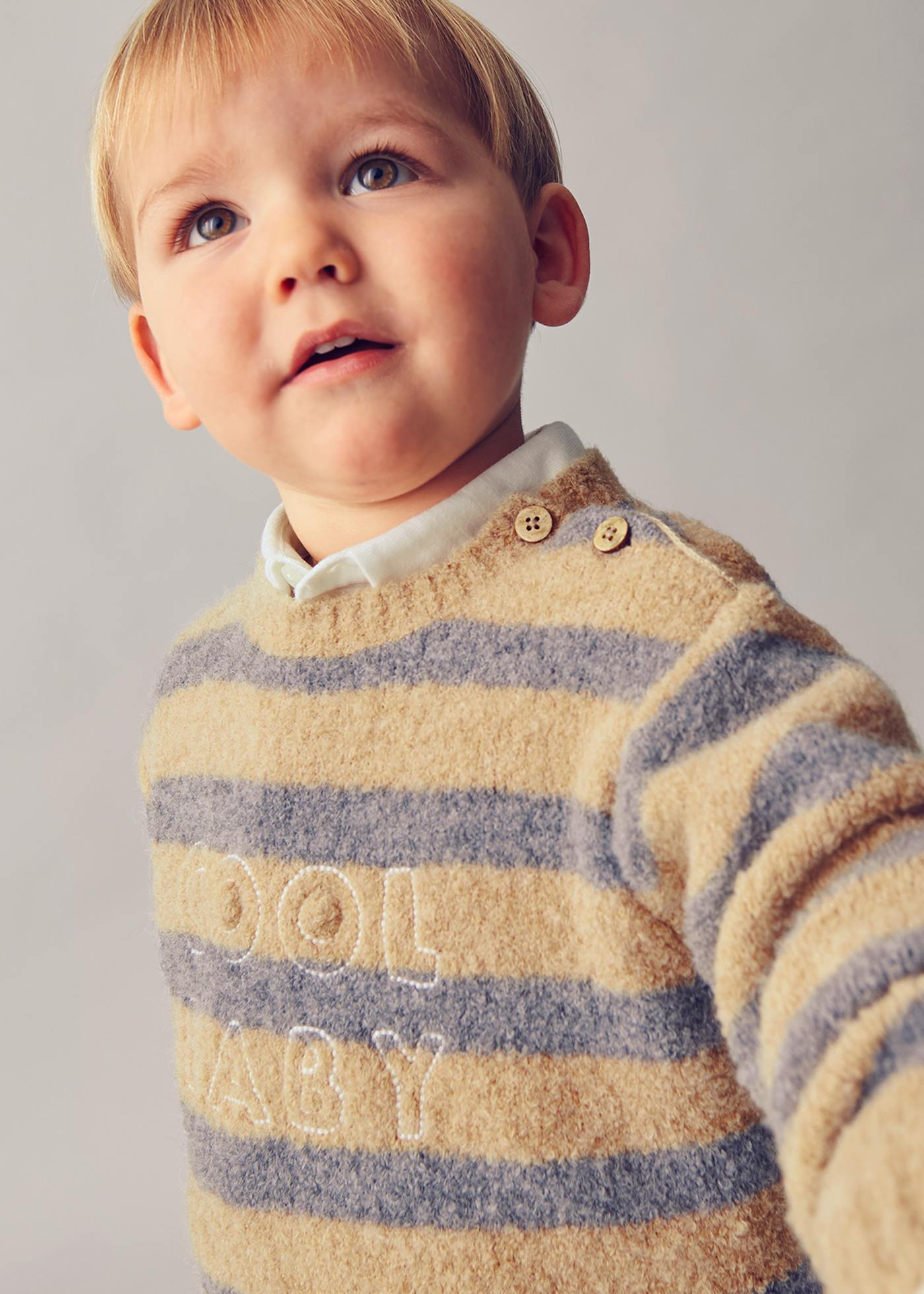 Sweter w pasy dla niemowlęcia