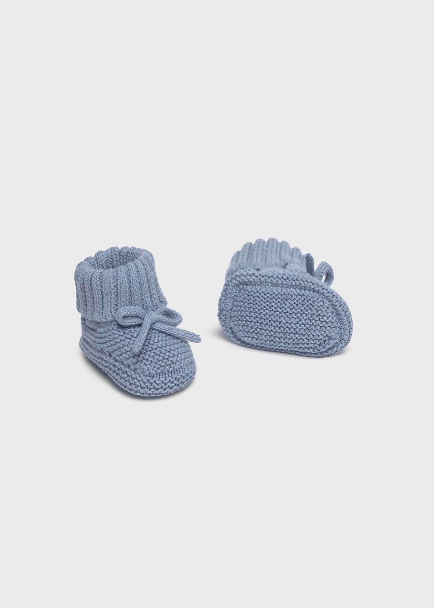 Newborn knitted booties