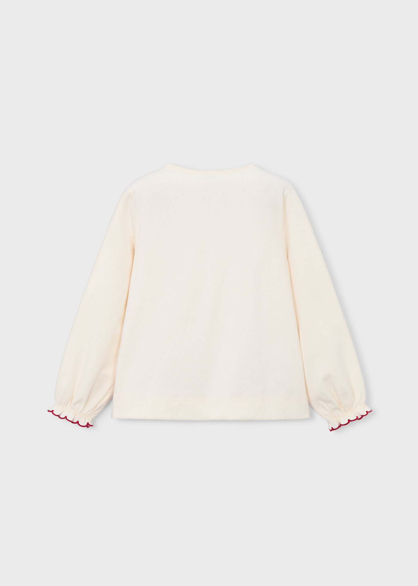 Playera apliques pétalos niña