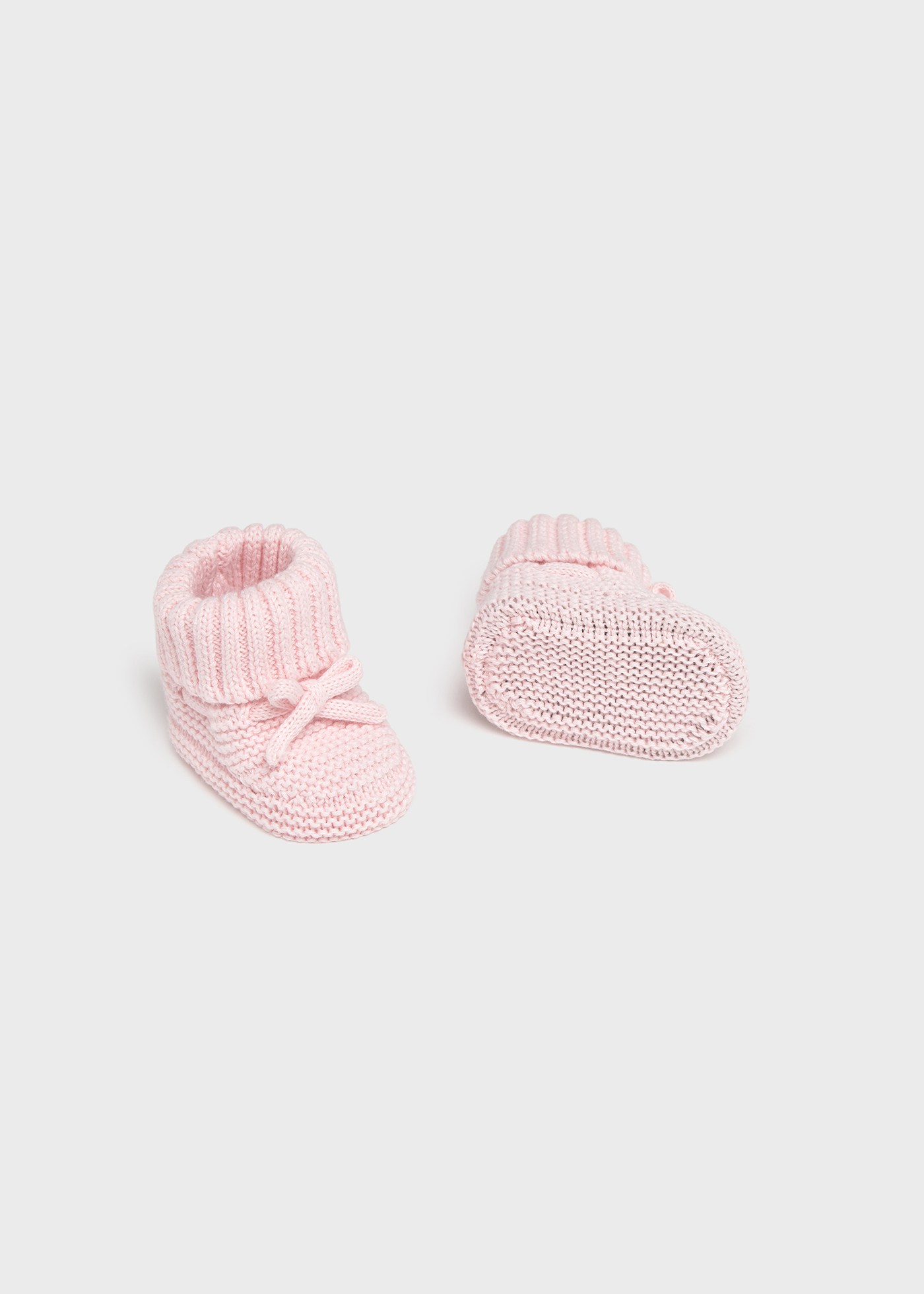 Newborn knitted booties
