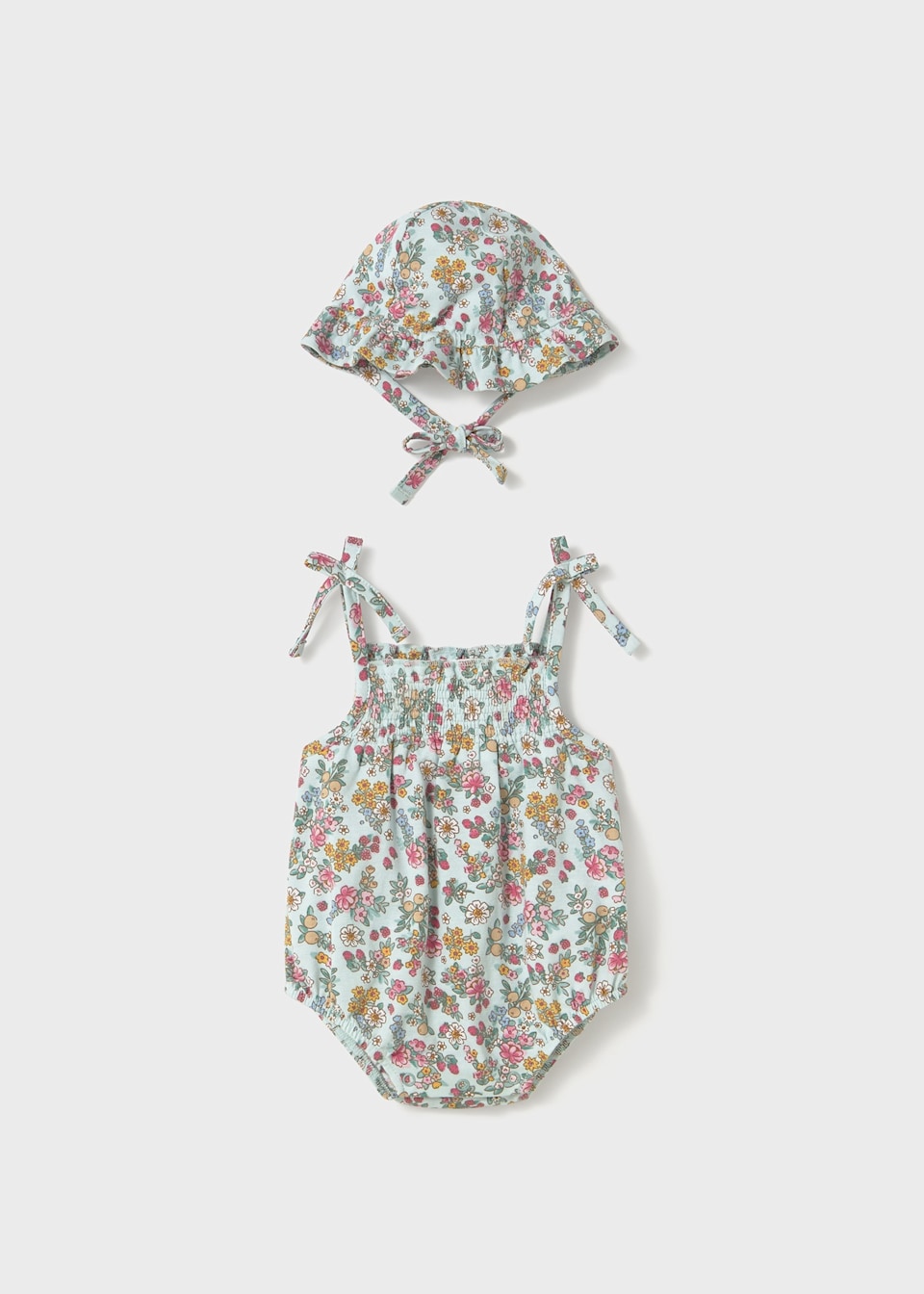 Newborn girl floral romper with bonnet