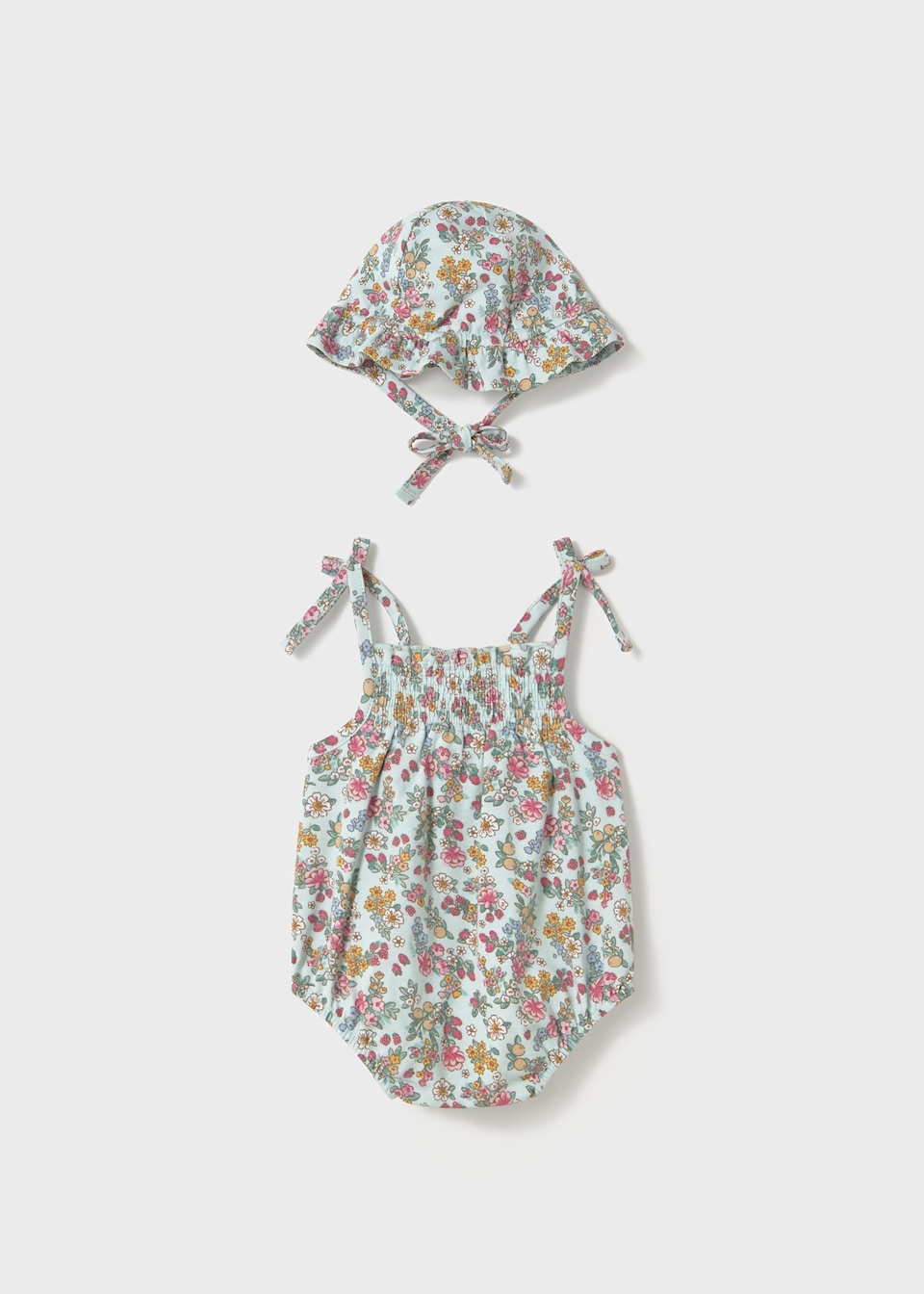 Newborn girl floral romper with bonnet