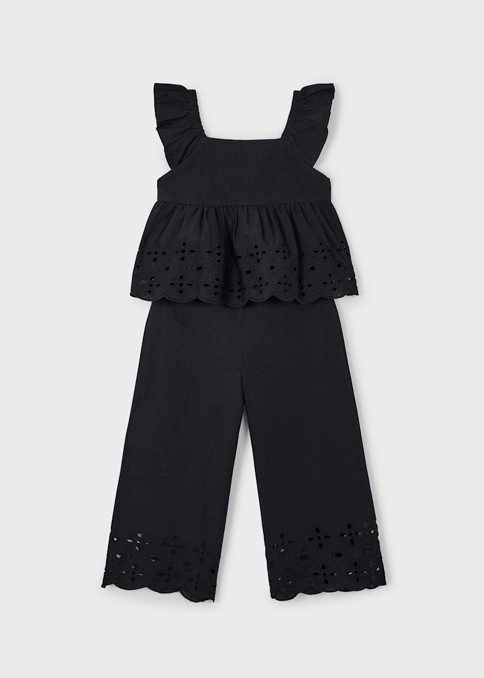 Conjunto pantalón y top perforados niña