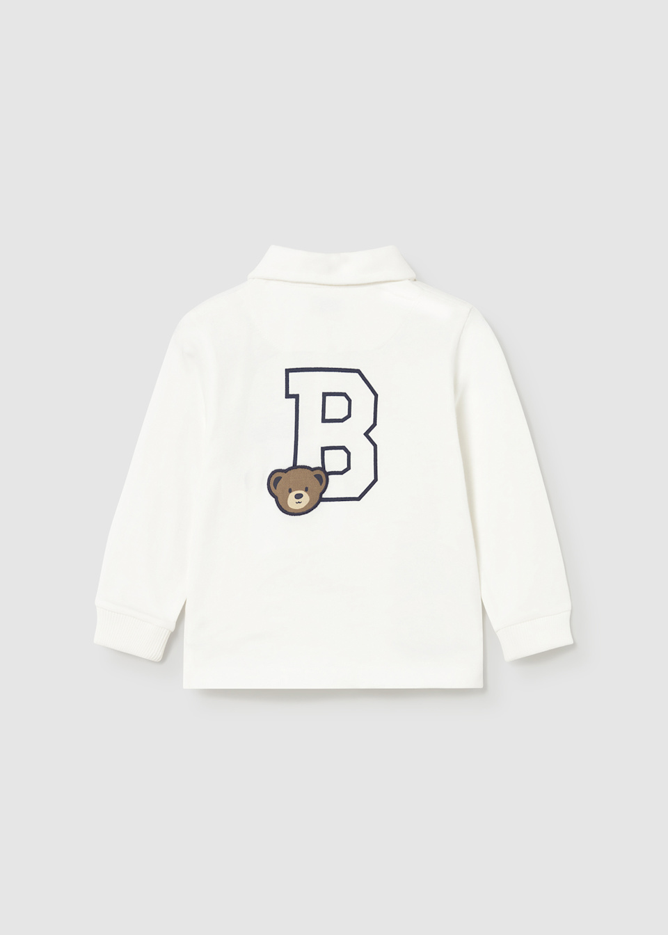 Polo uni avec détails bébé