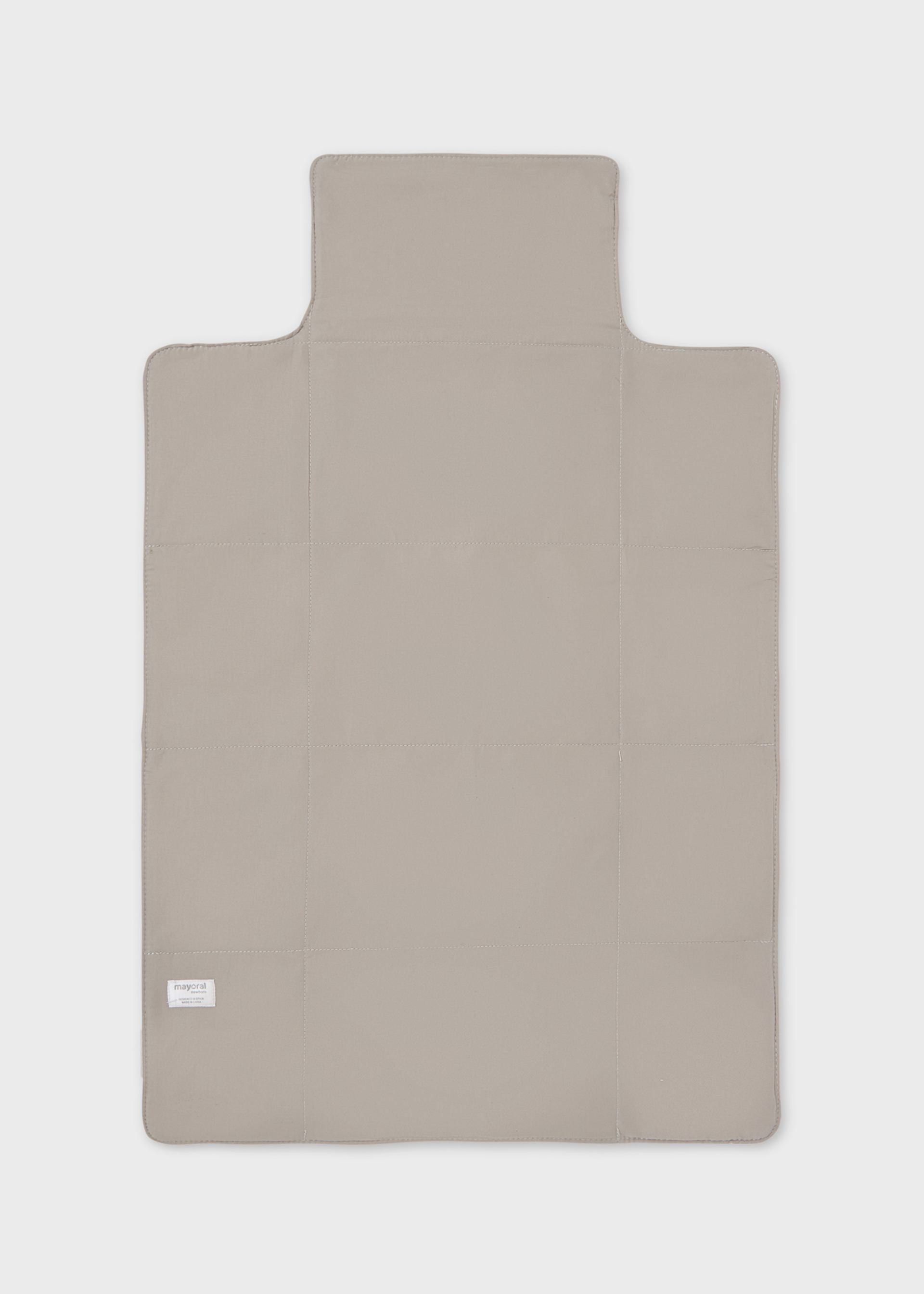 Baby changing mat with polka dots