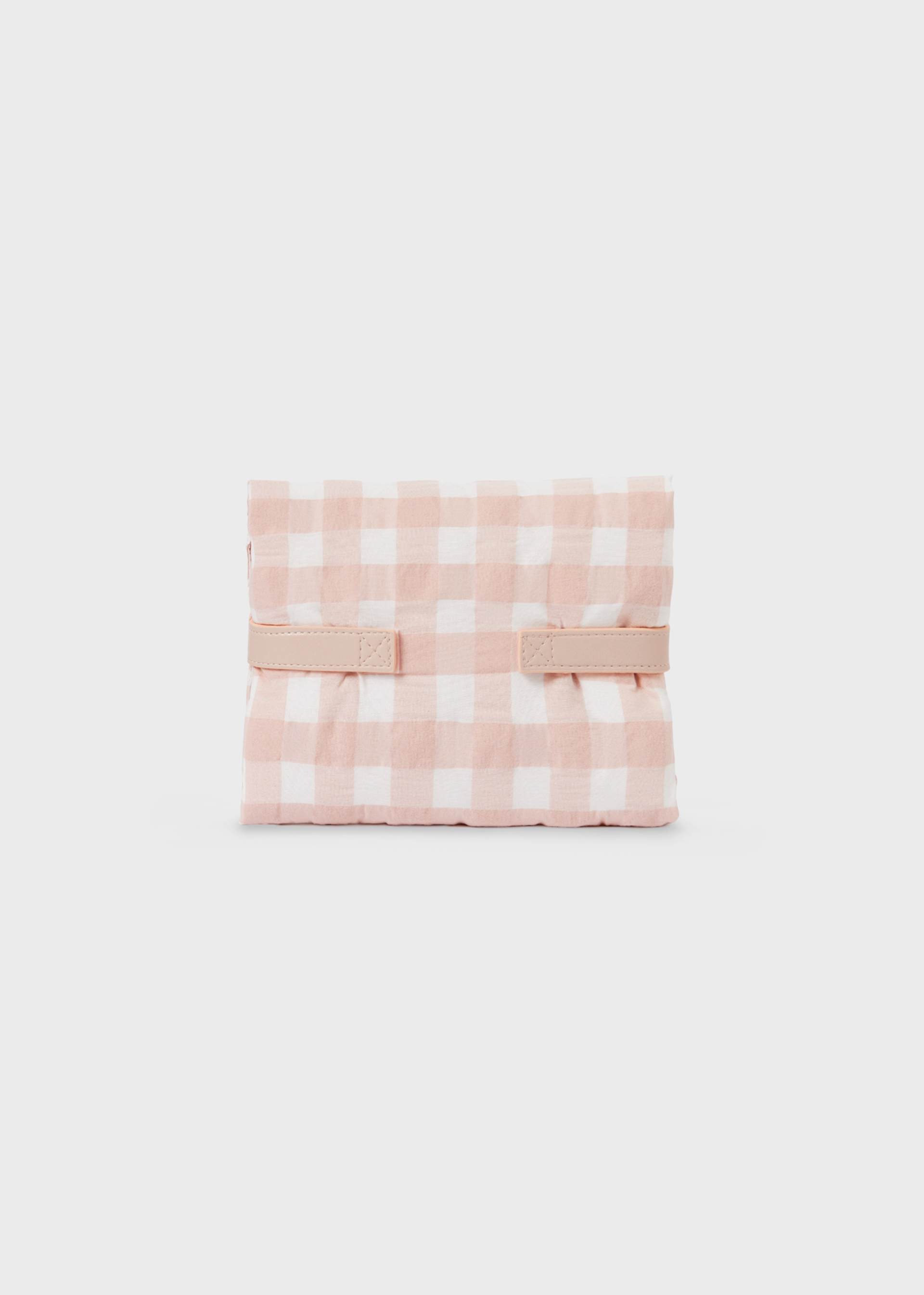 Baby changing mat with a gingham pattern