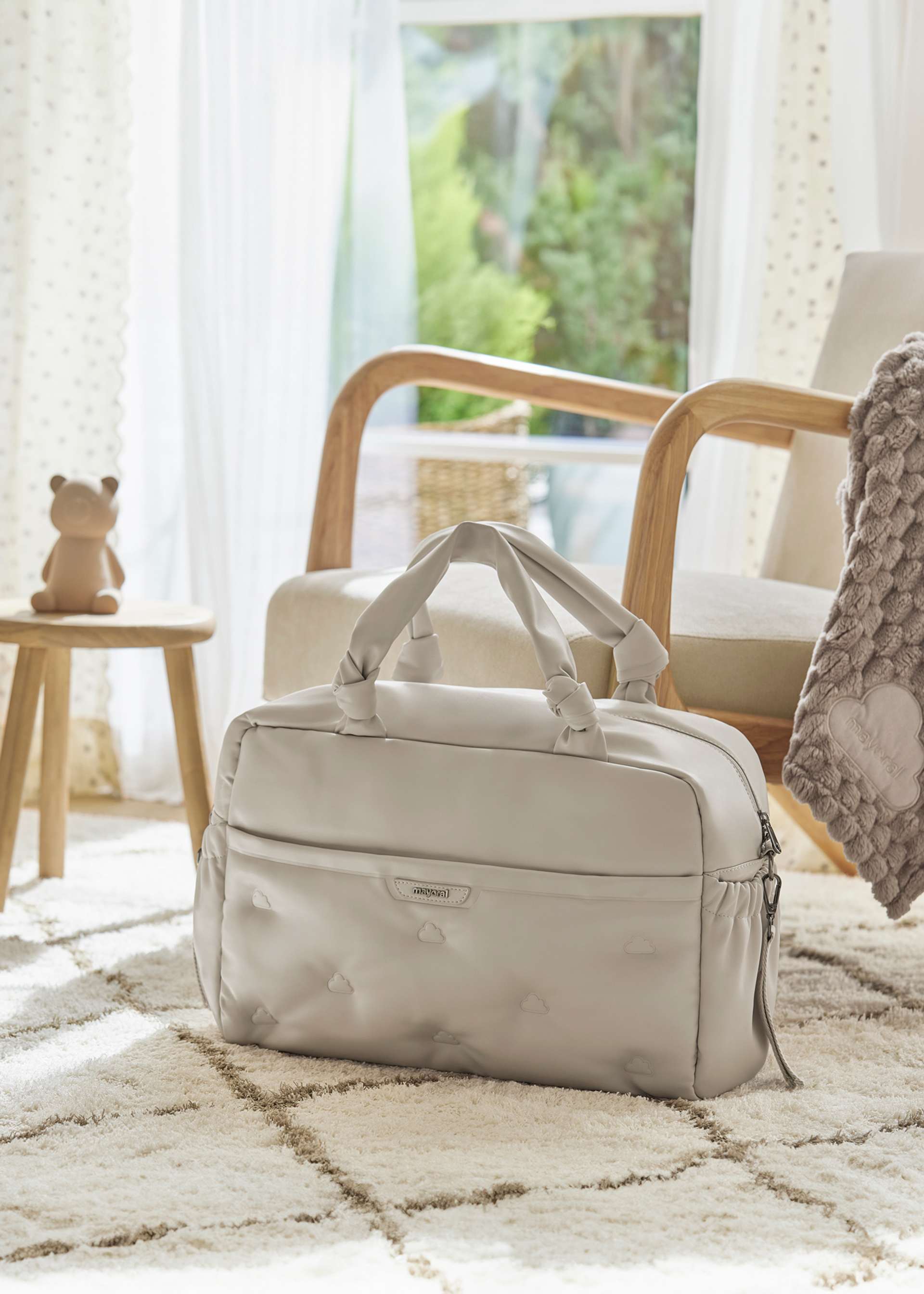 Padded baby changing bag