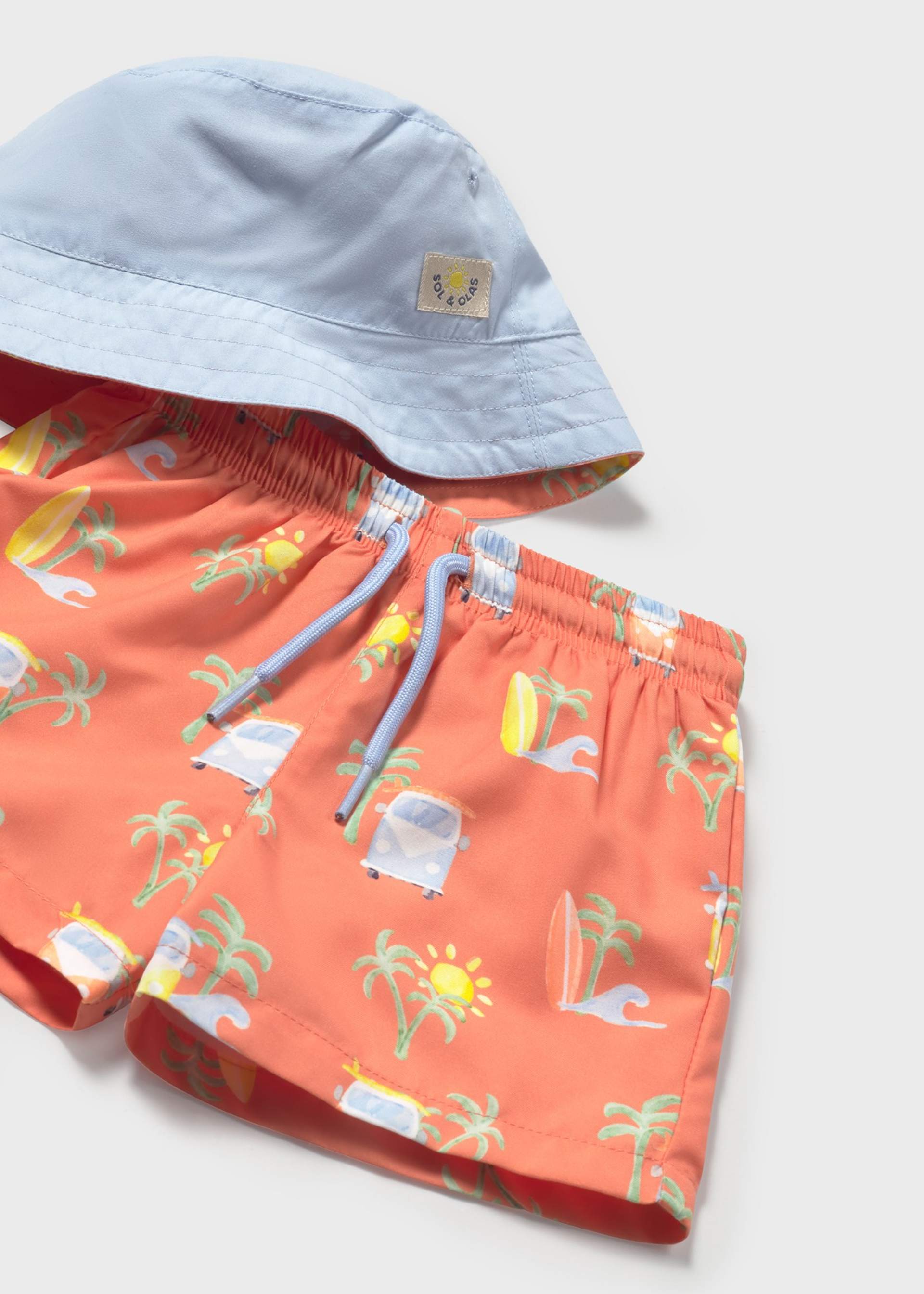 Conjunto traje de baño y gorro reversible protección solar bebé