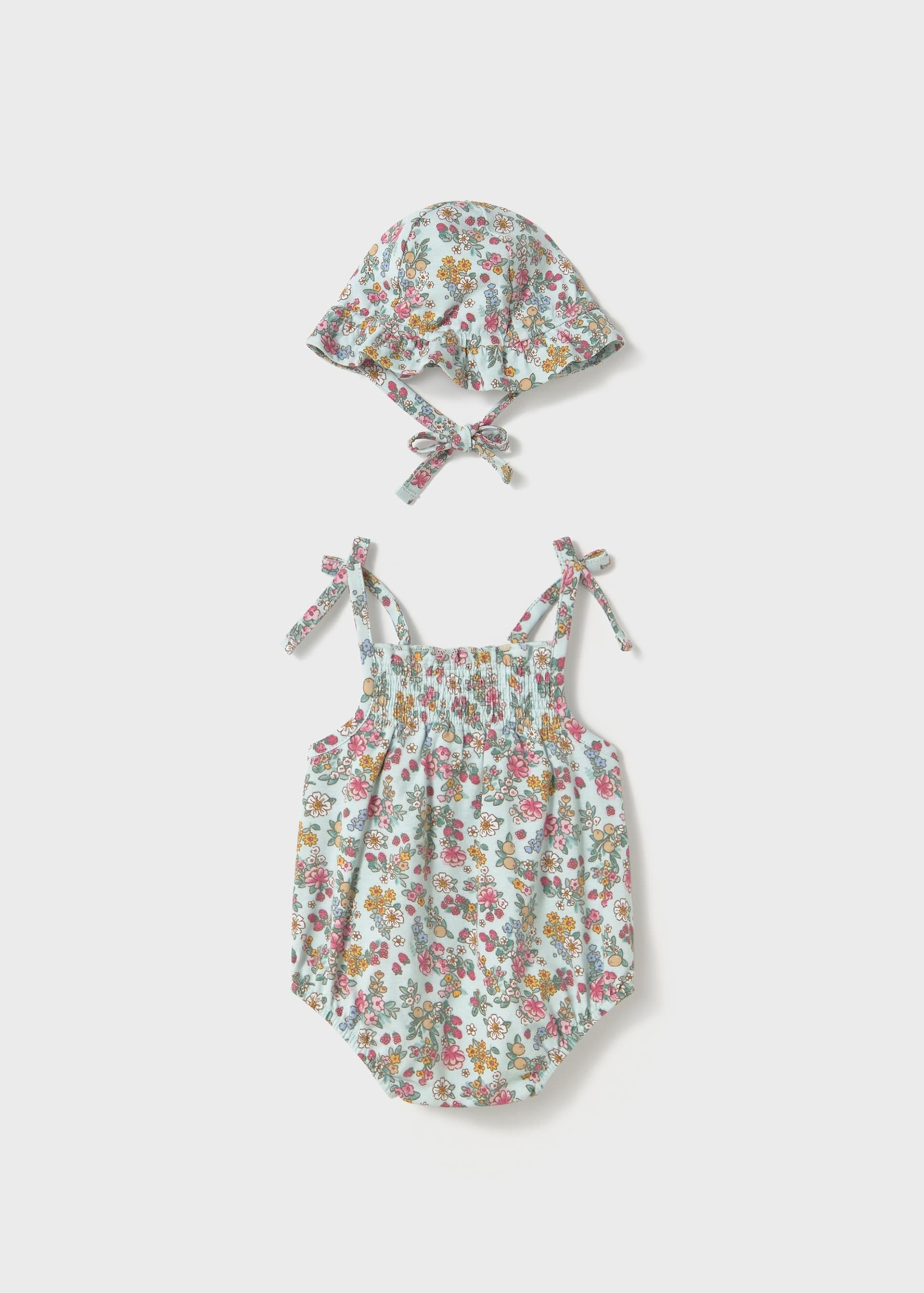 Newborn girl floral romper with bonnet Newborn girl floral romper with bonnet