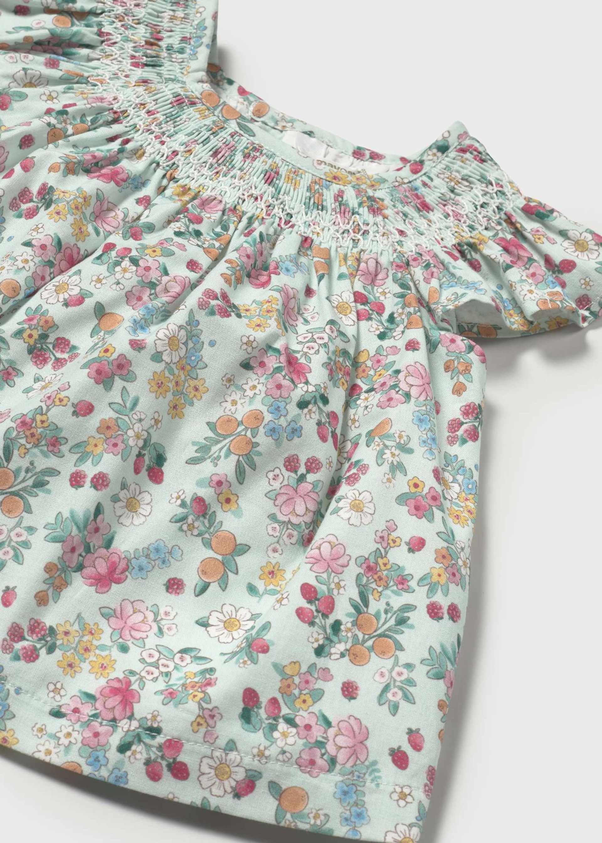 Robe à fleurs avec bloomer nouveau-né Robe à fleurs avec bloomer nouveau-né