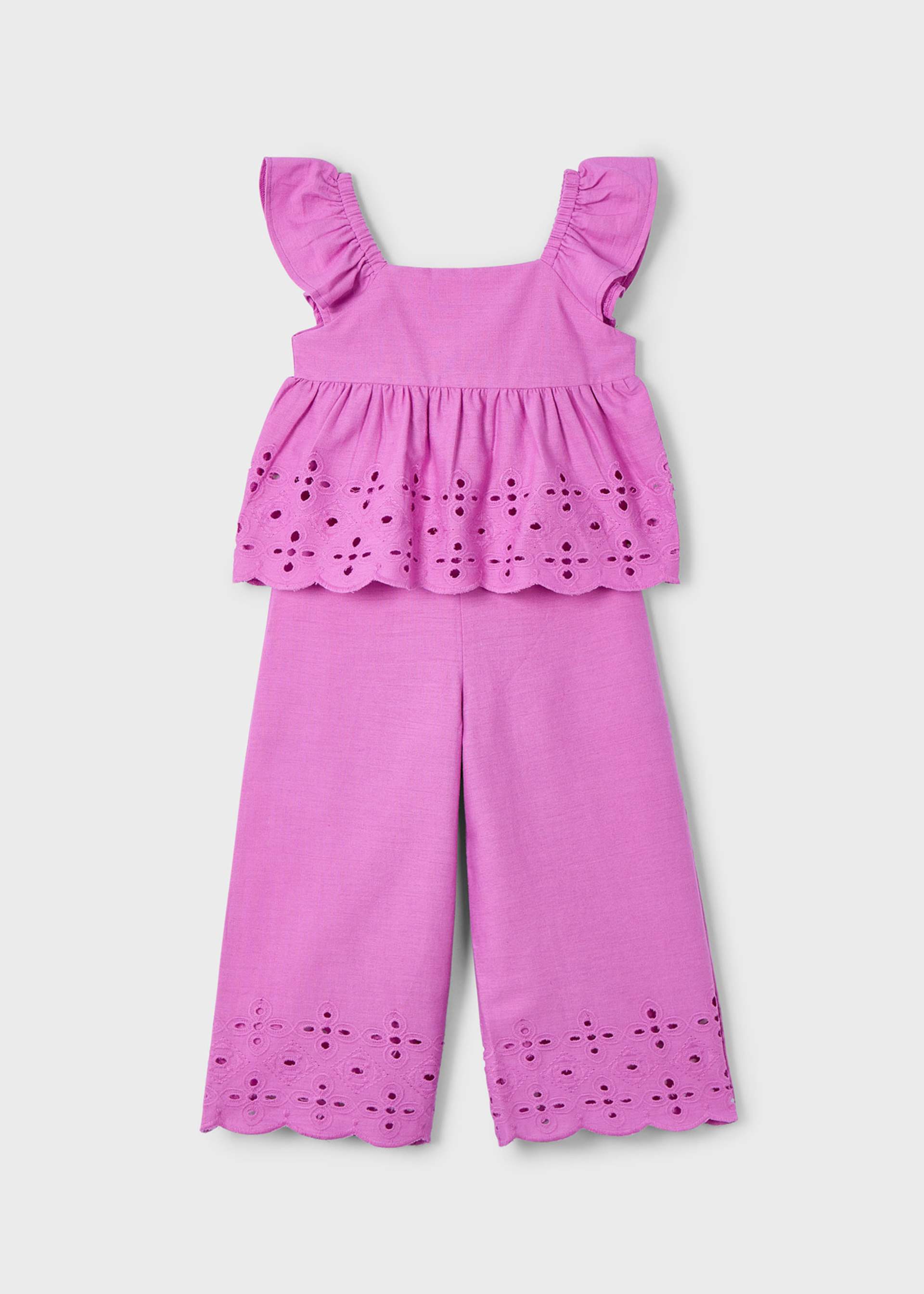 Conjunto pantalón y top perforados niña