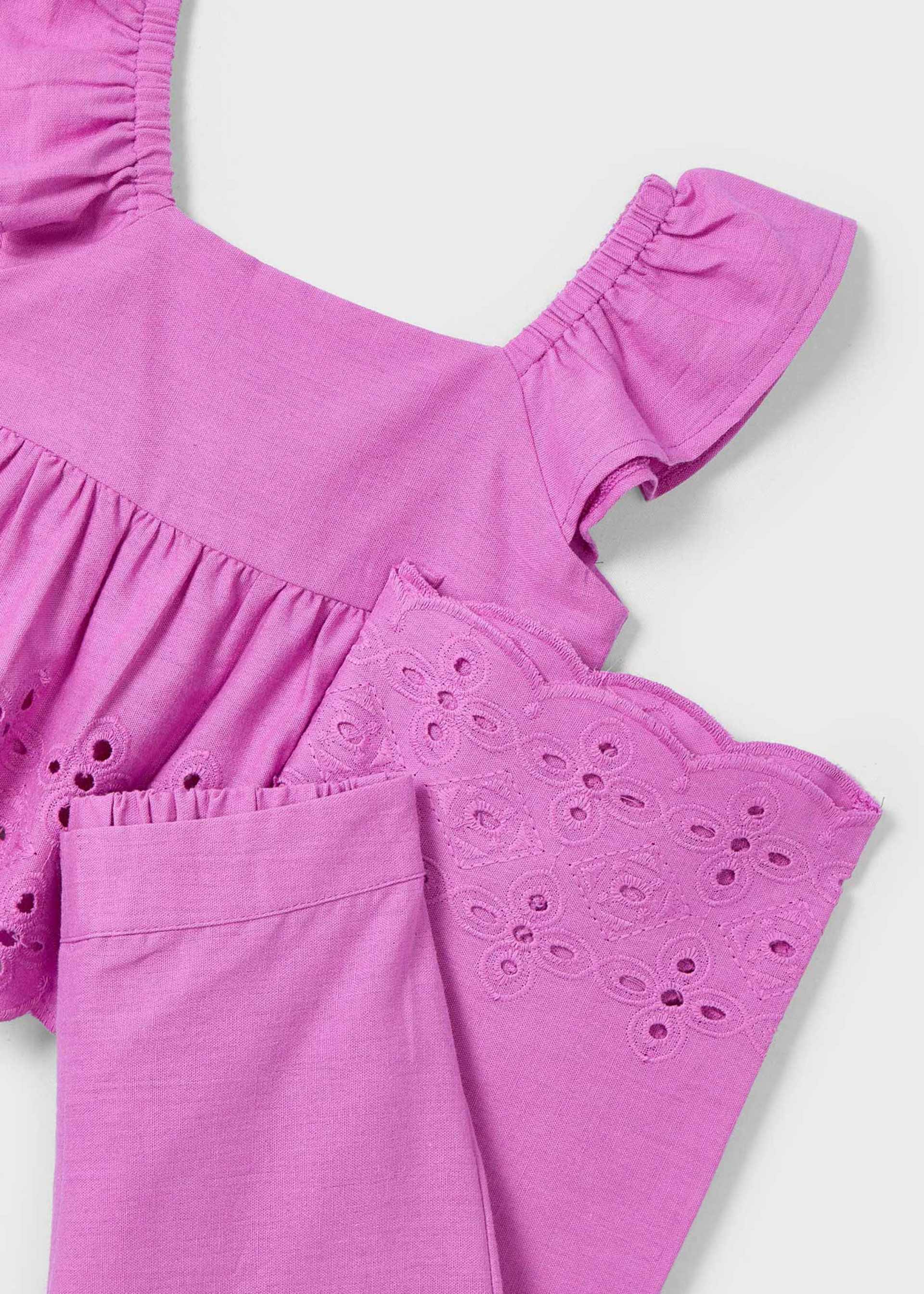 Conjunto pantalón y top perforados niña