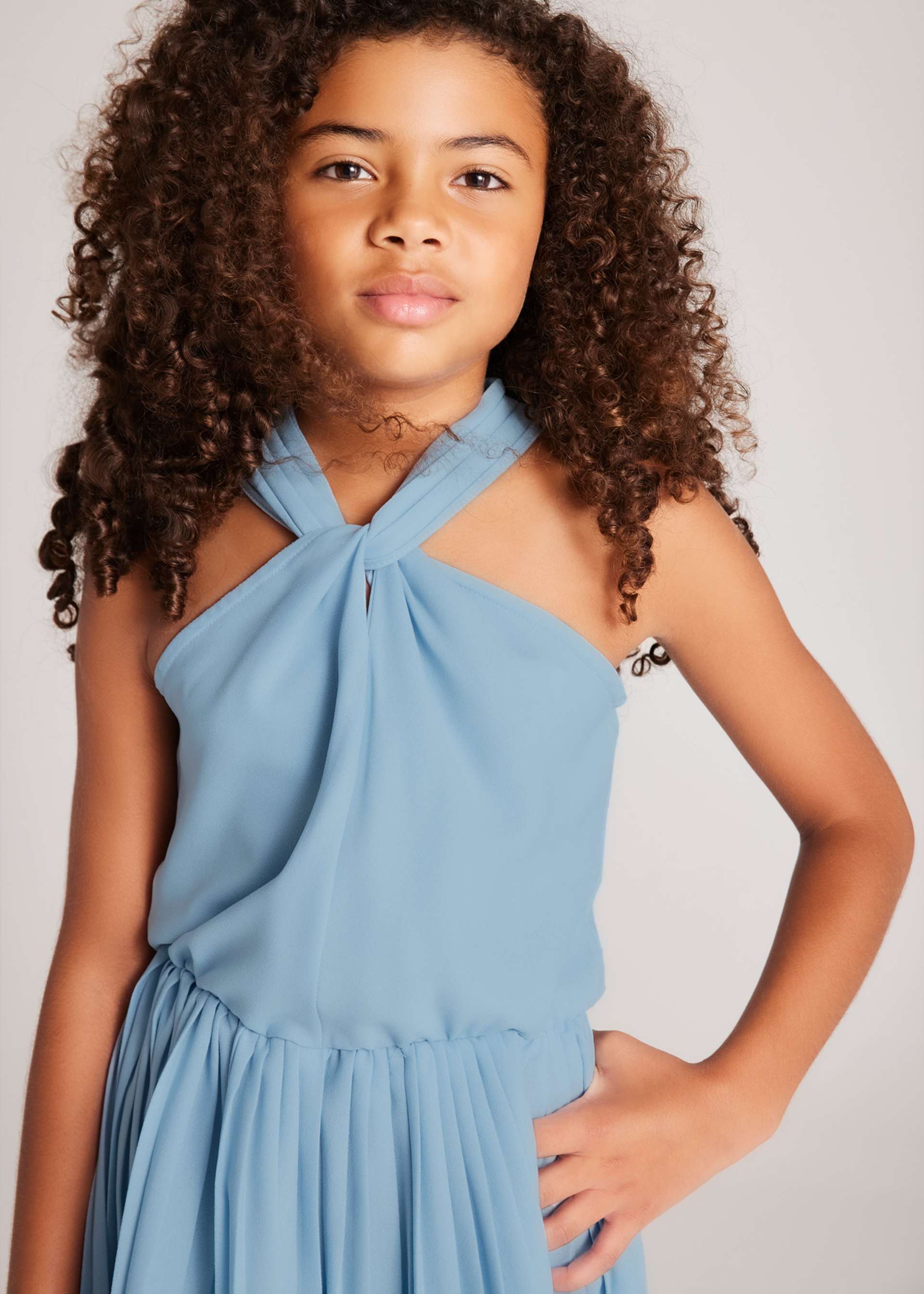 Mono corto plisado chica