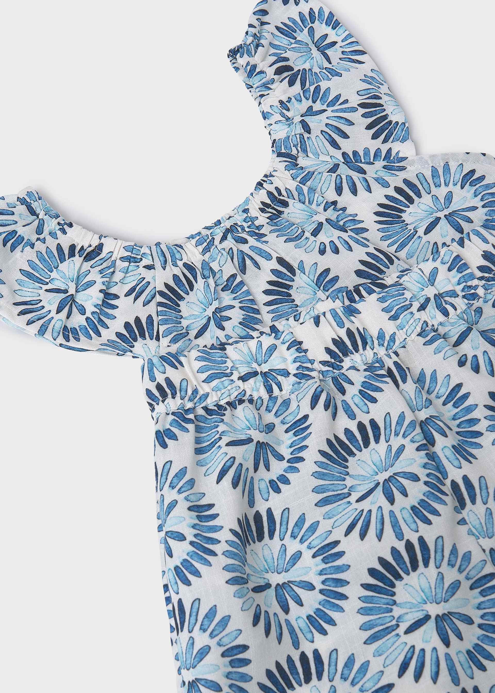 Conjunto pantalón corto y top estampado chica