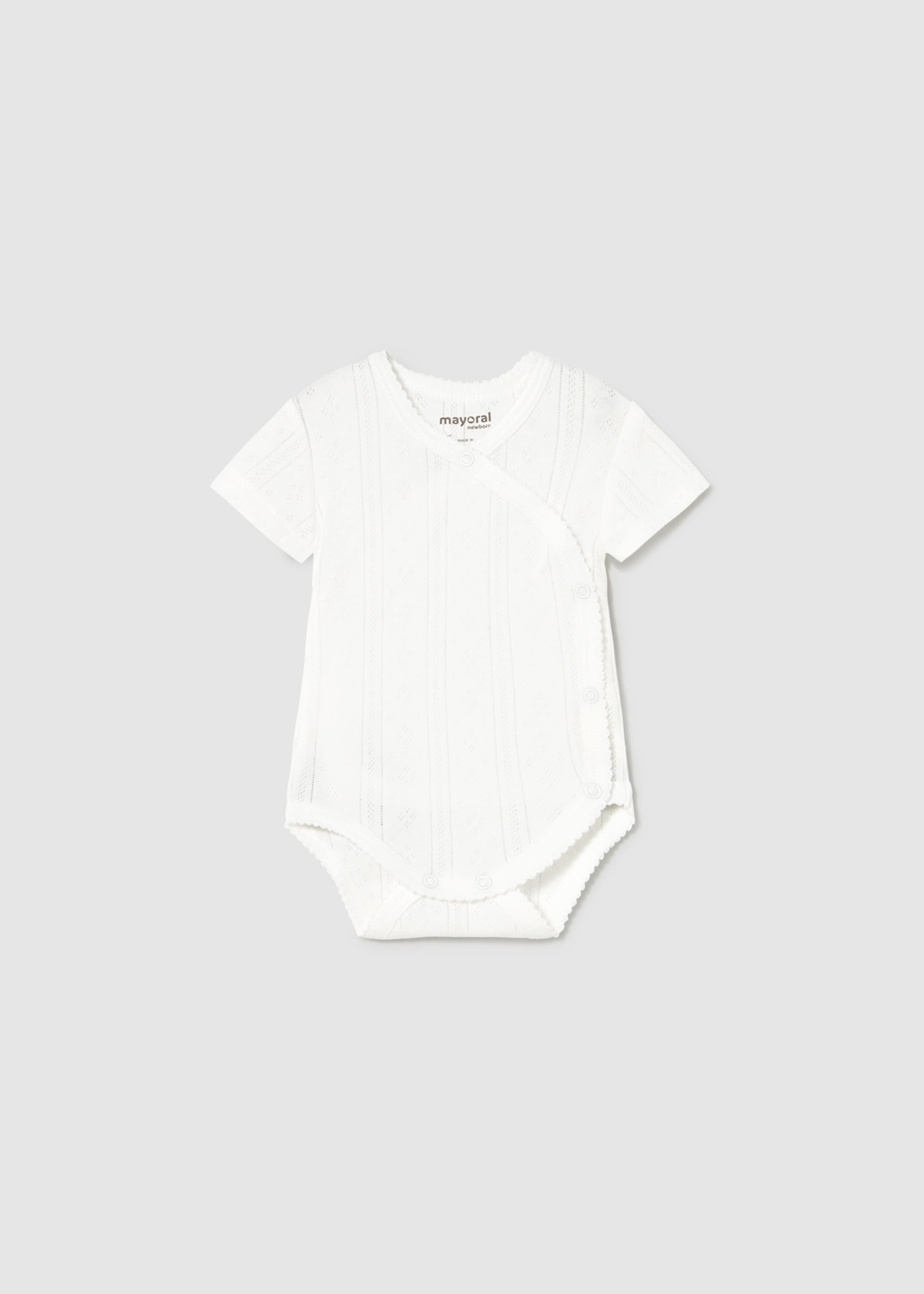 Newborn girl openwork bodysuit Newborn girl openwork bodysuit