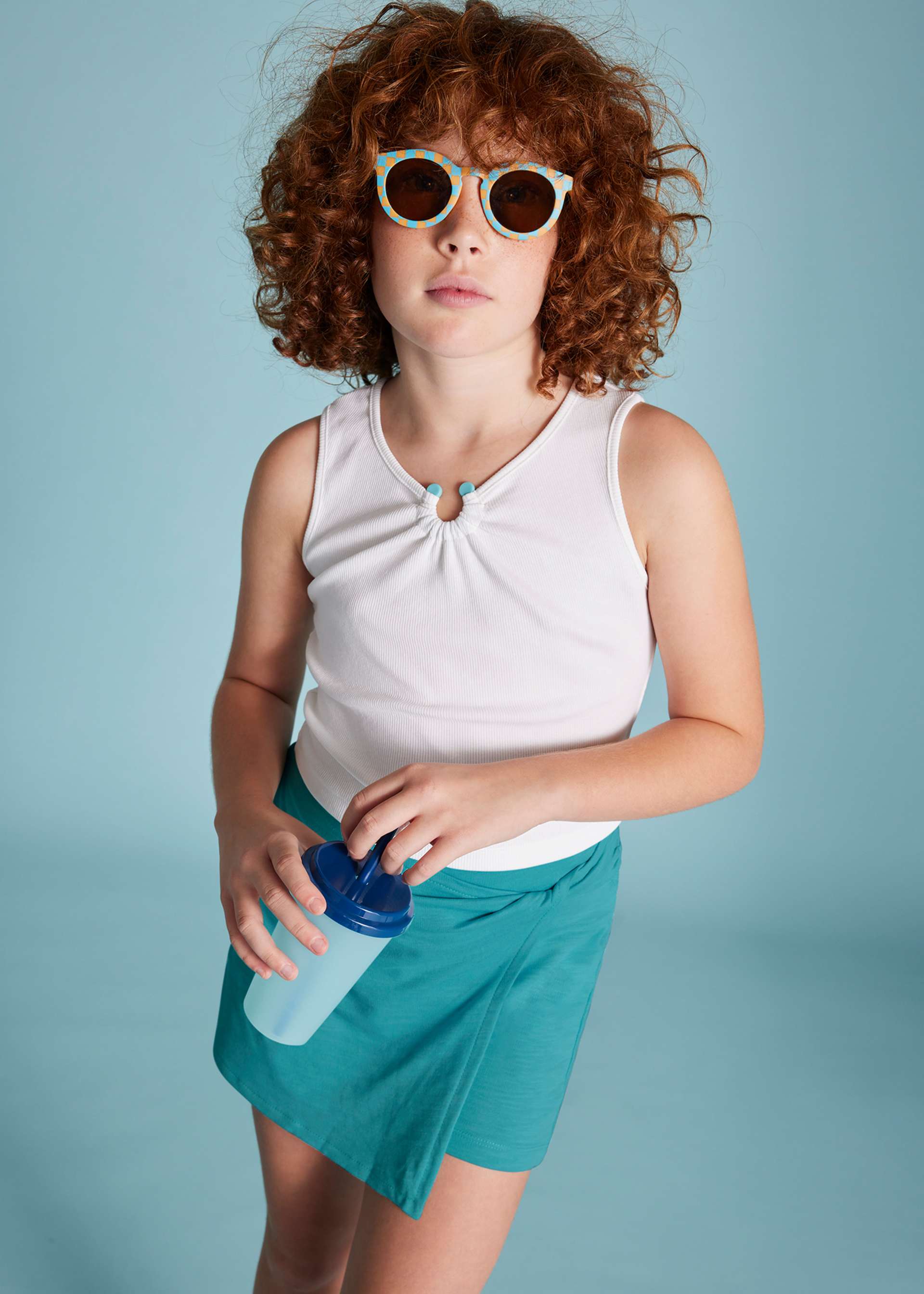 Conjunto falda pantalón y playera canalé chica