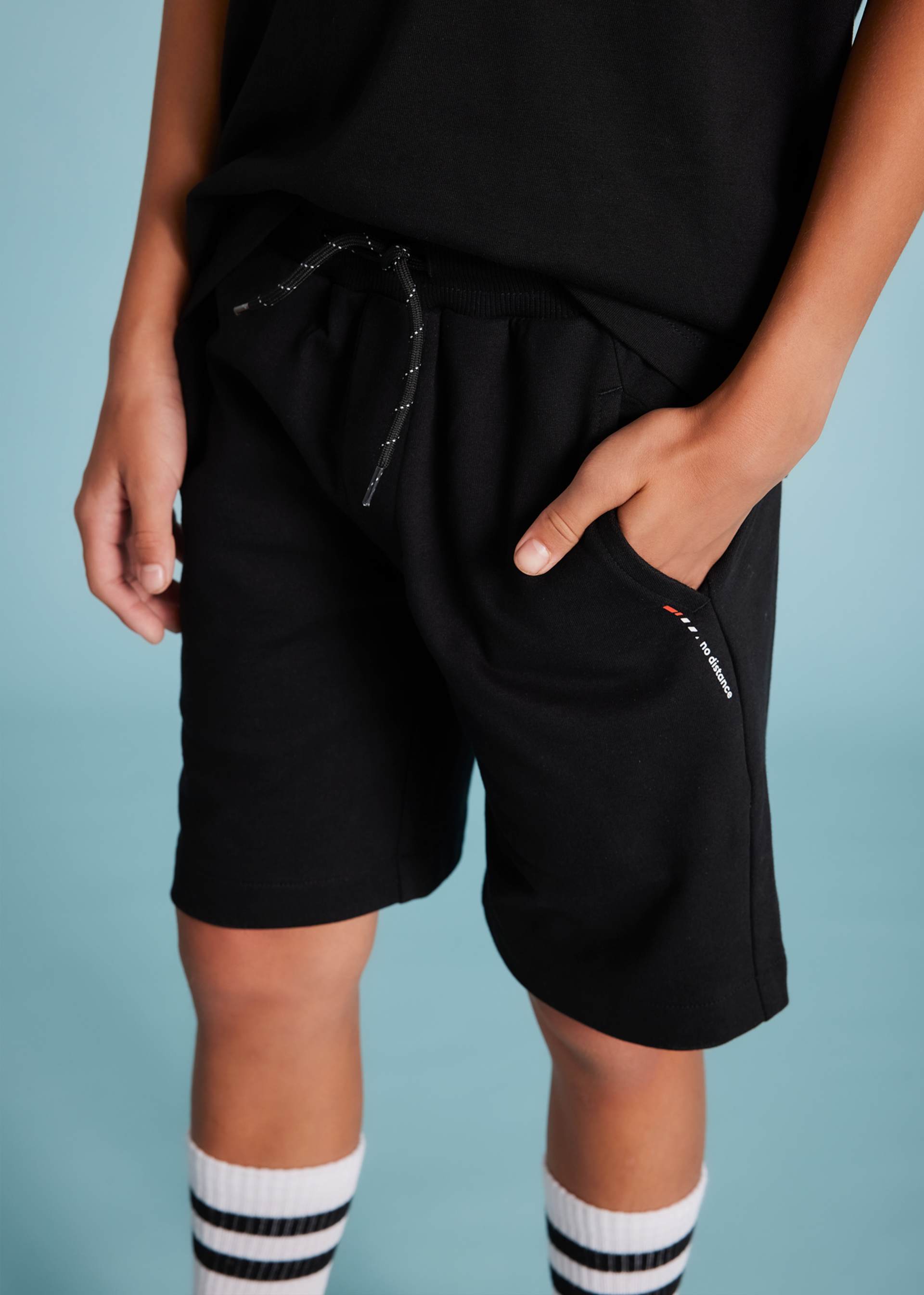 Conjunto bermuda y playera estampado trasero chico