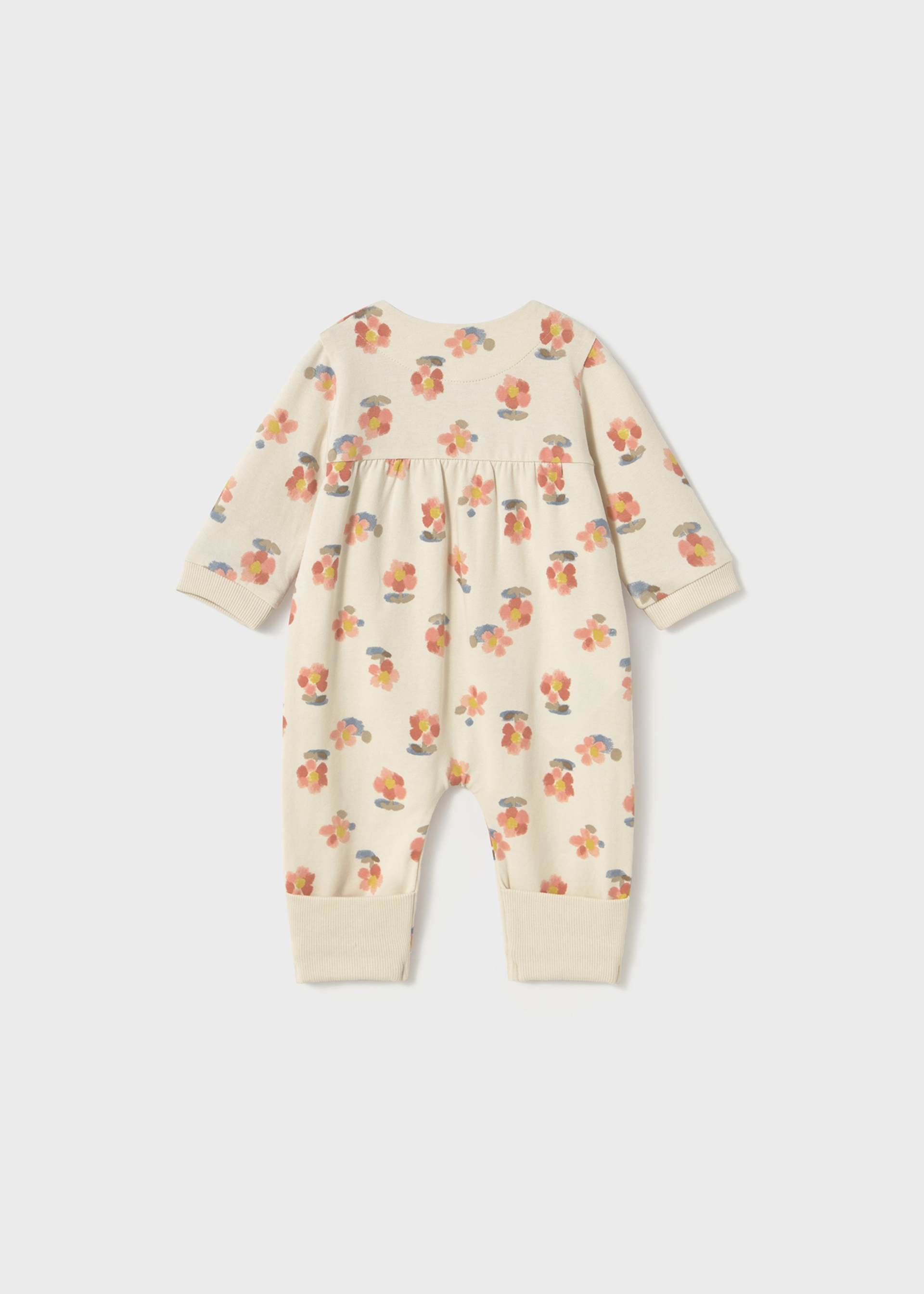 Newborn girl romper with foot covers