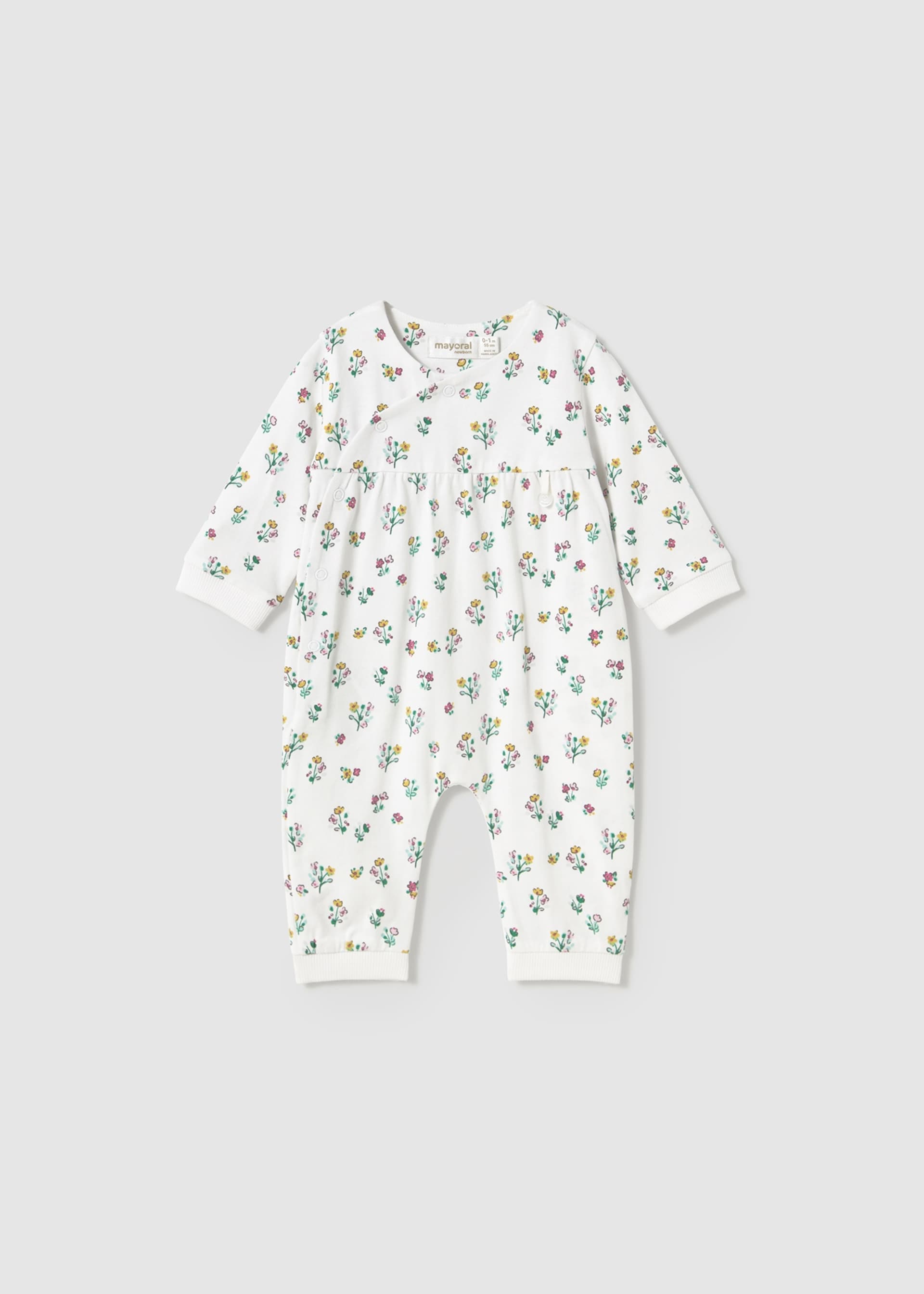 Newborn girl romper with foot covers
