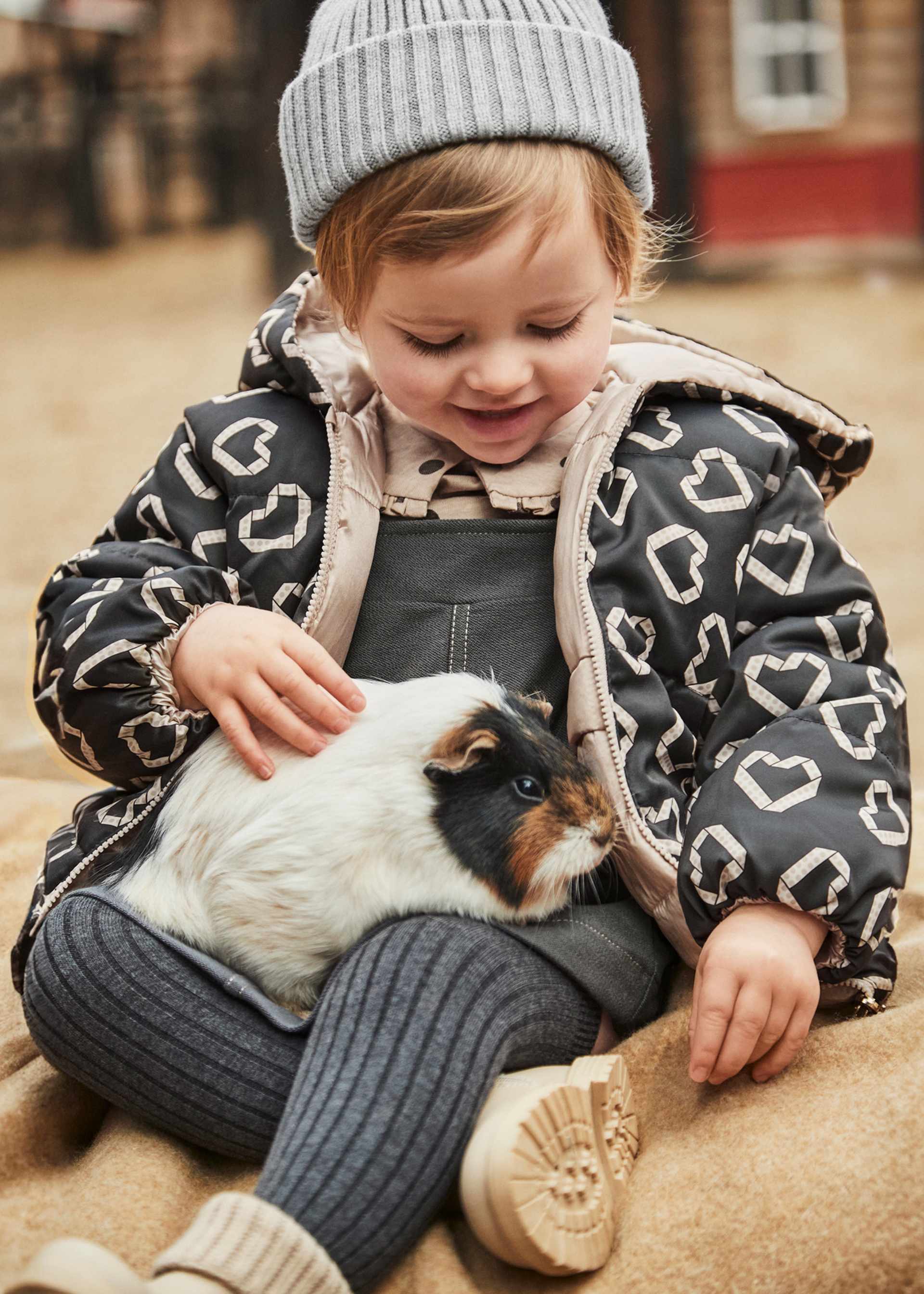 Manteau réversible imprimé bébé