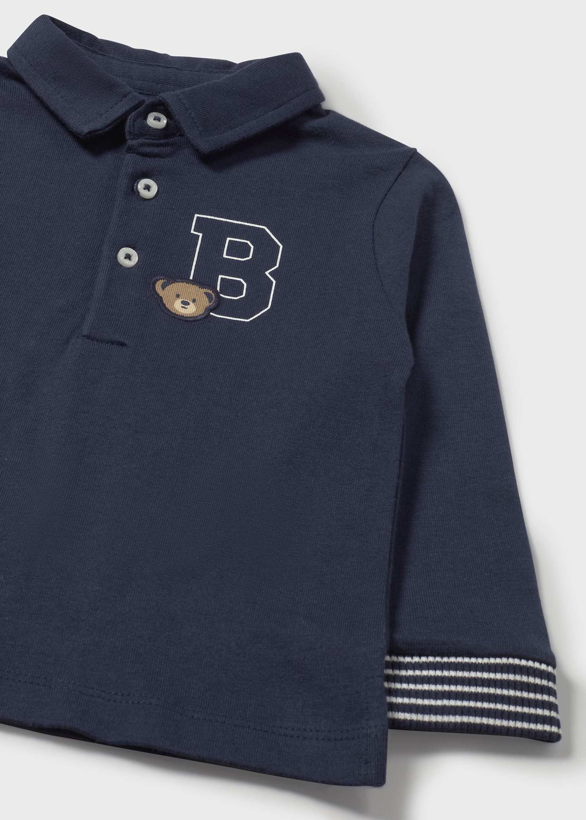 Polo uni avec détails bébé