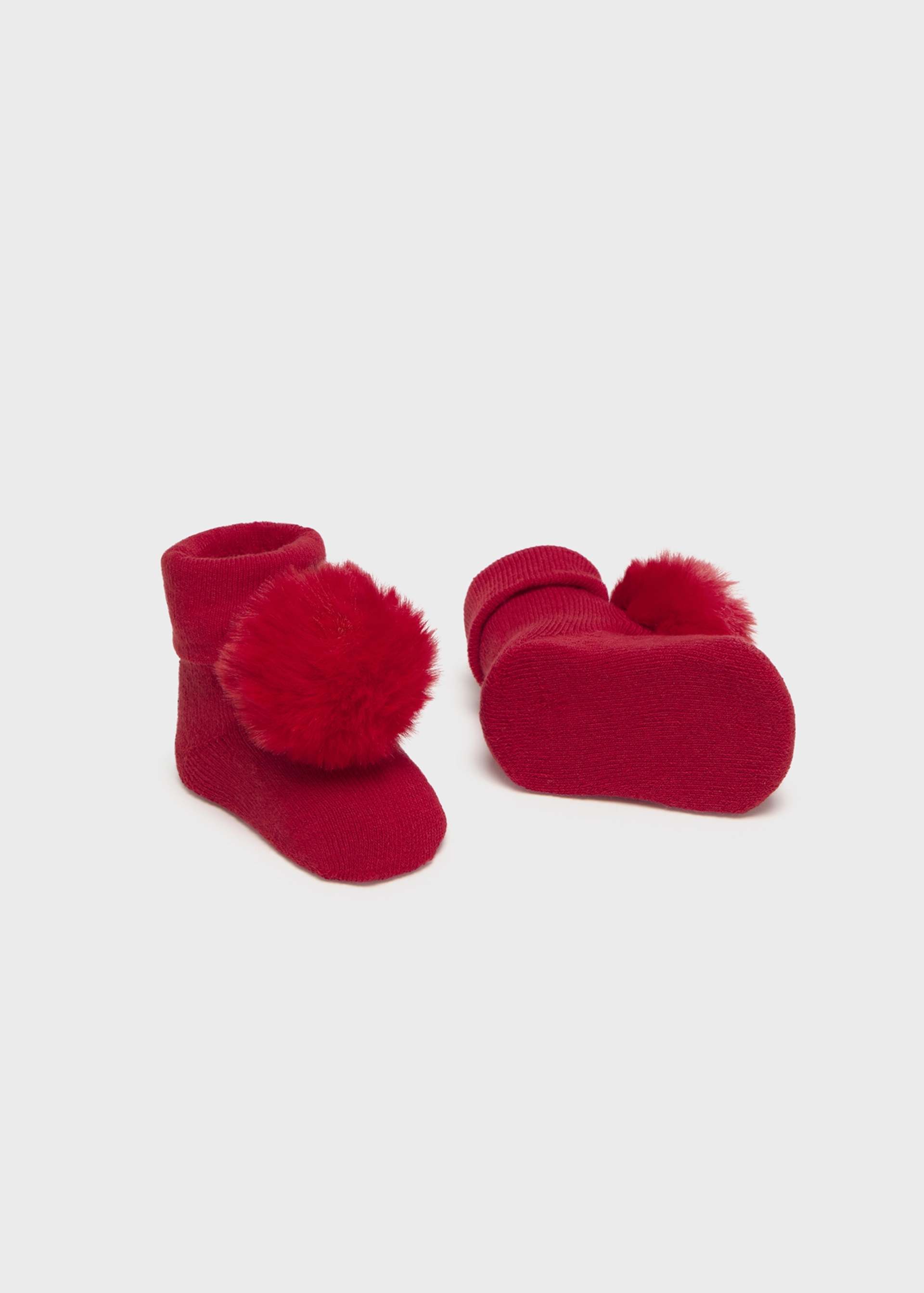 Set diadema y calcetines recién nacida