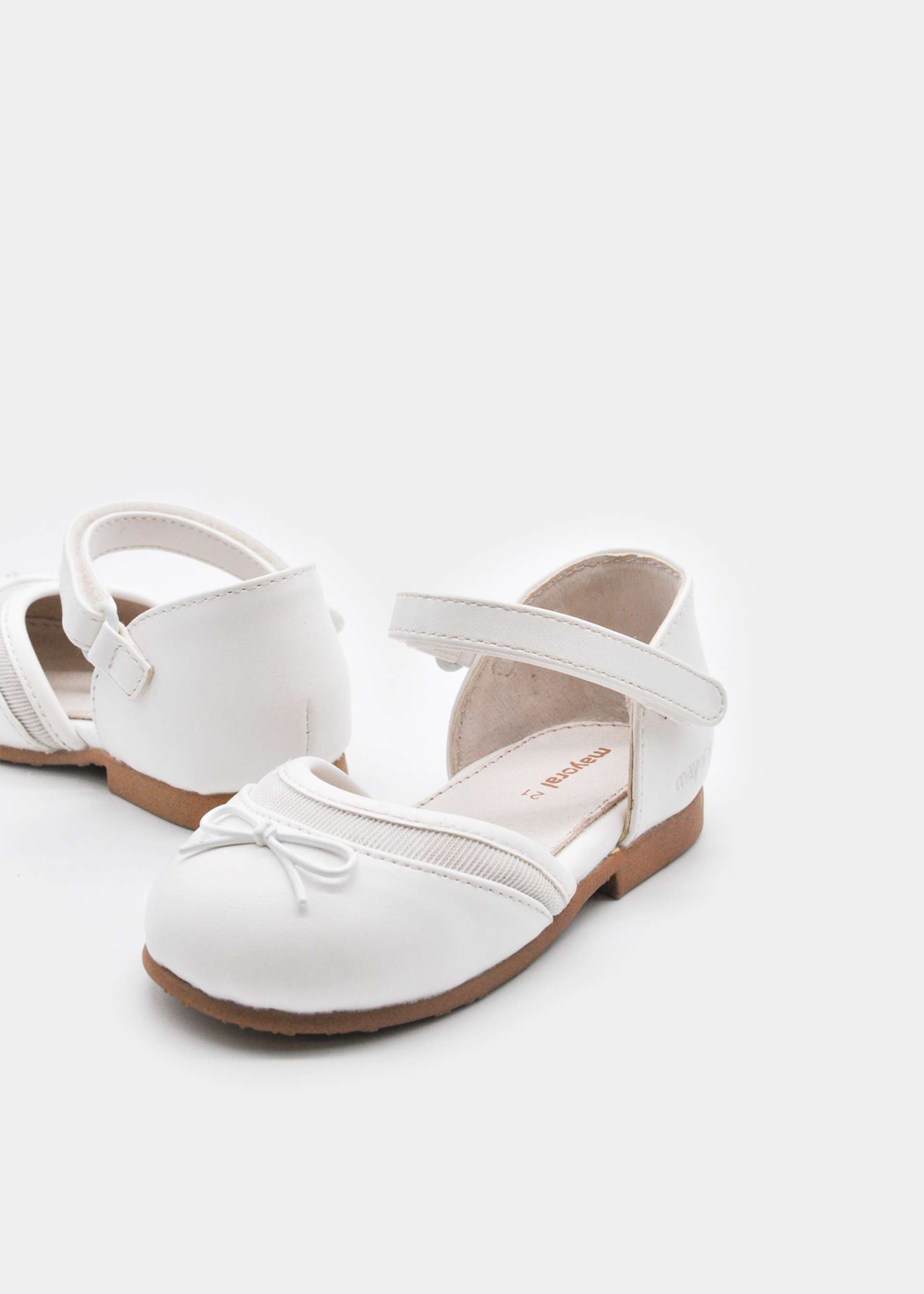Zapatos polipiel moño bebé