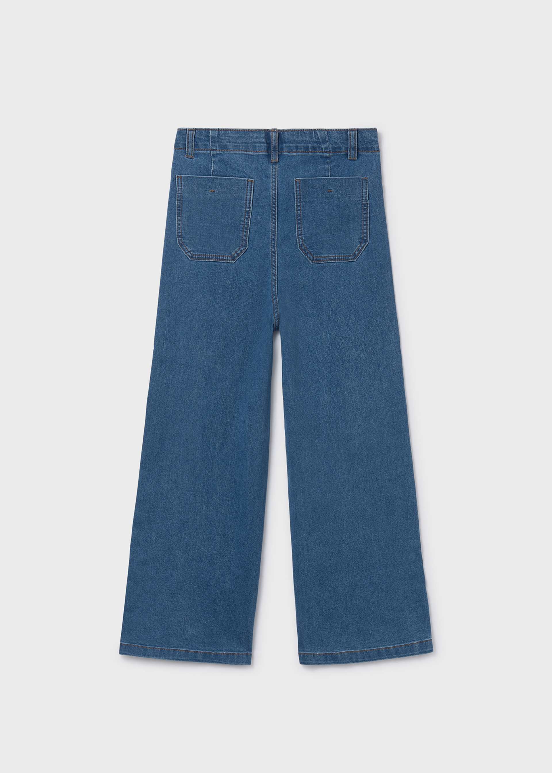 Pantalón de mezclilla acampanado chica