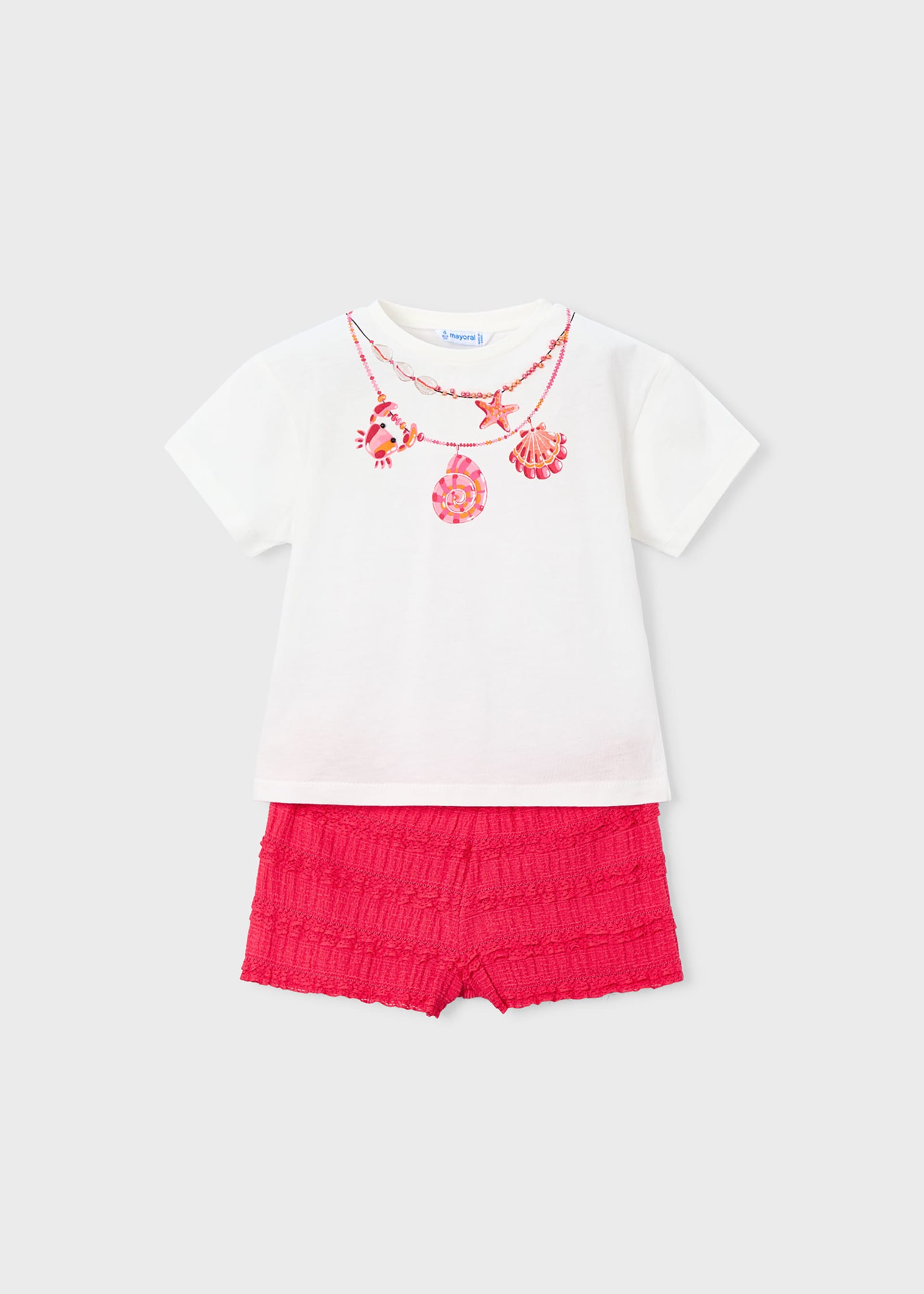 Conjunto pantalón corto volantes y camiseta estampada niña