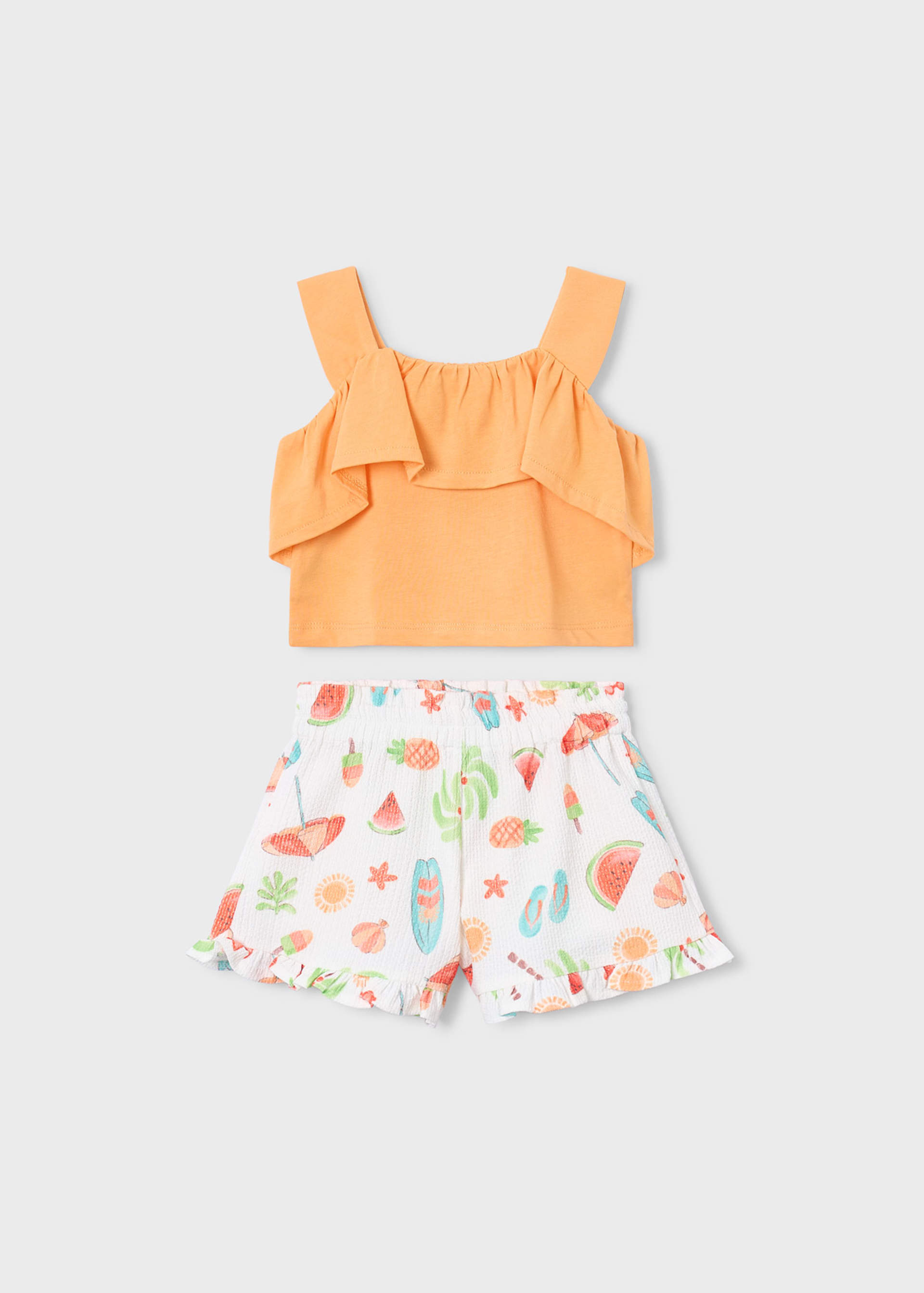 Conjunto calção estampado e top folhos menina