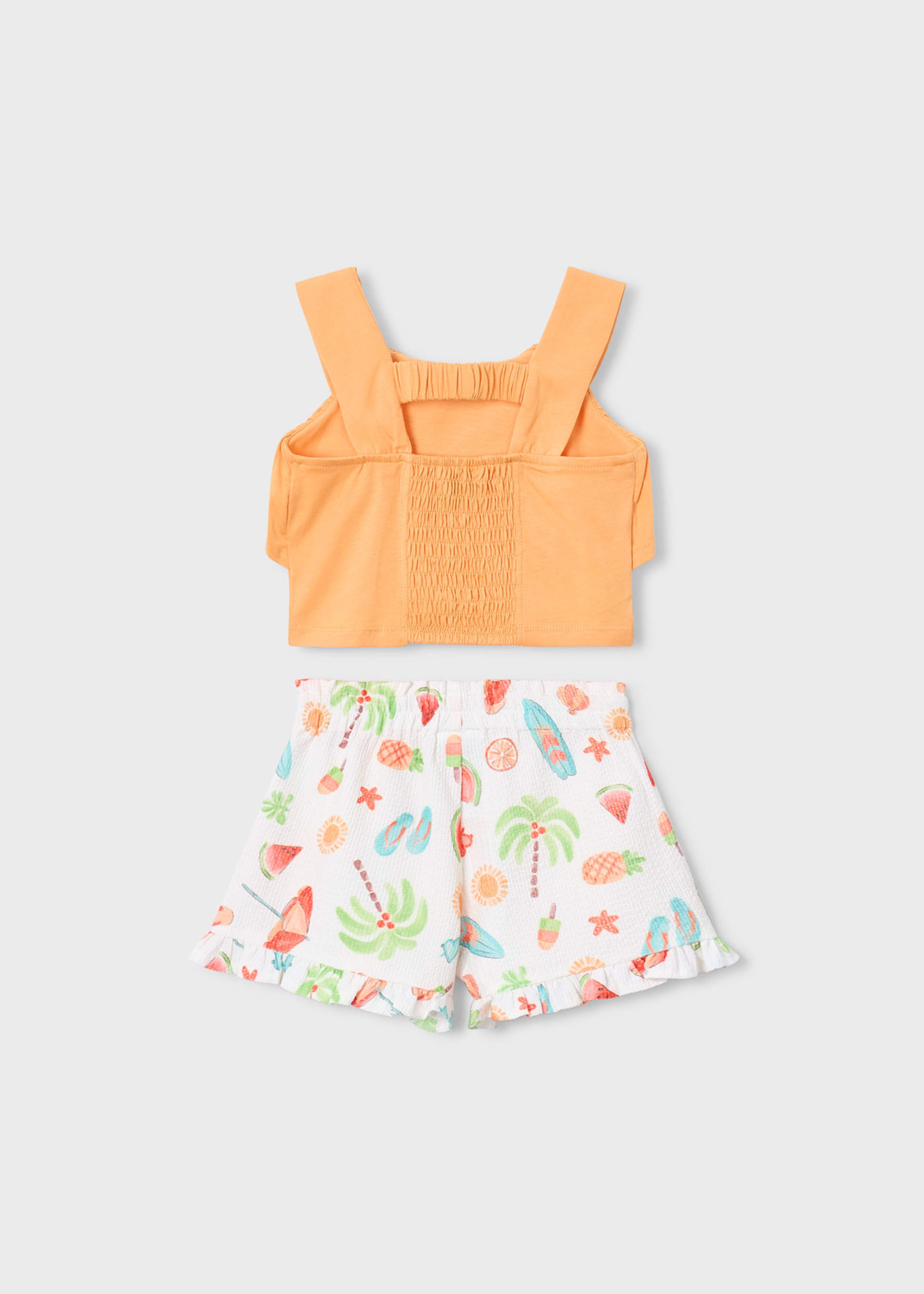 Conjunto calção estampado e top folhos menina