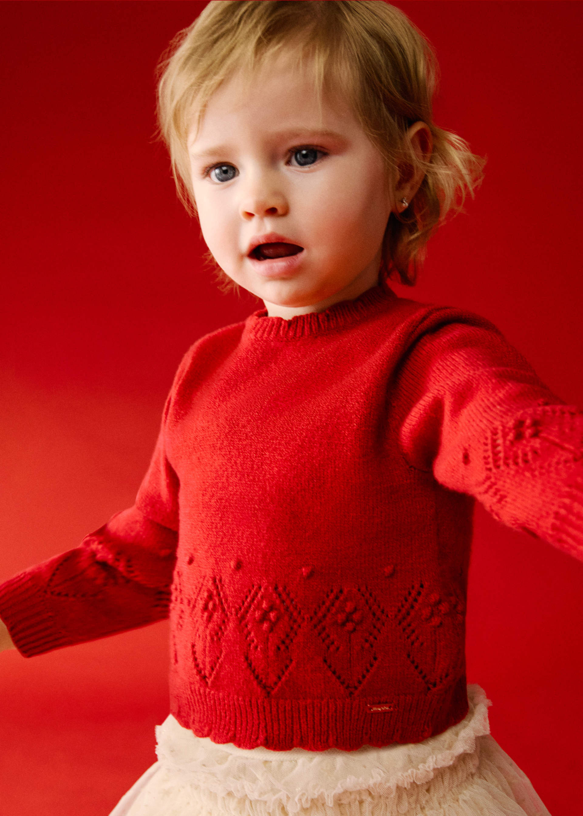 Sweter ażurowy dla niemowlęcia