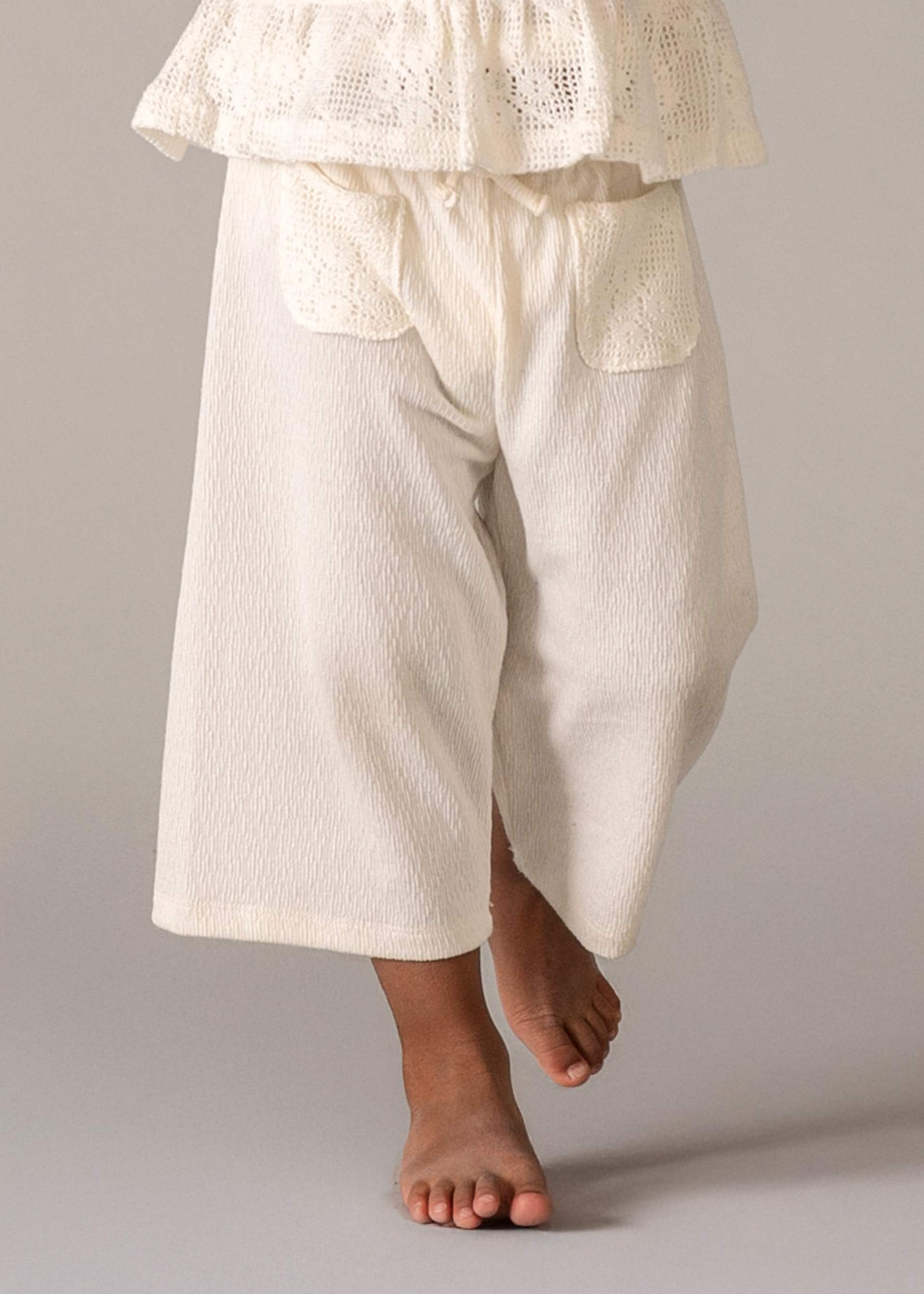 Completo pantalone e top crochet neonata