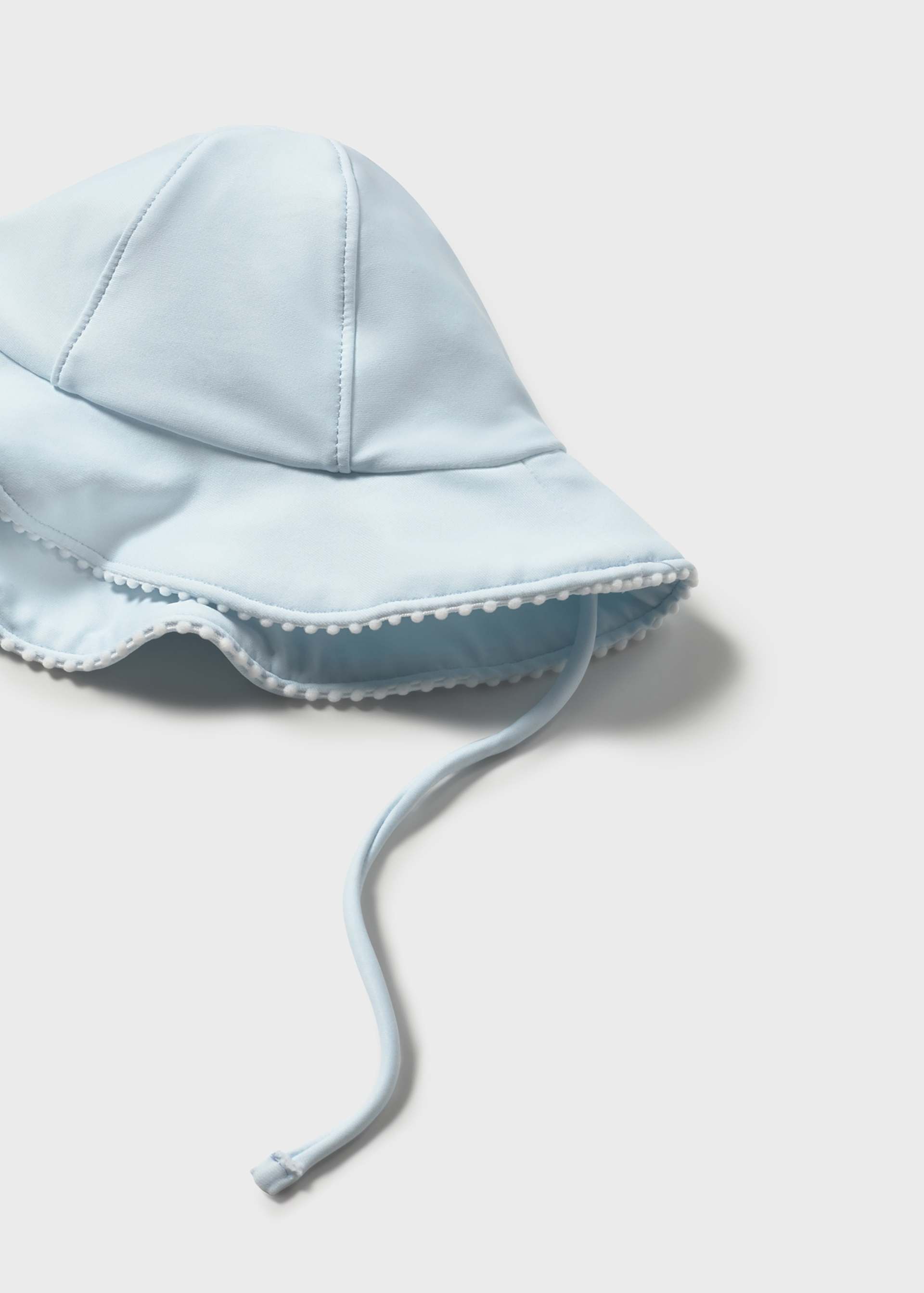 Bañador con gorro protección solar recién nacida