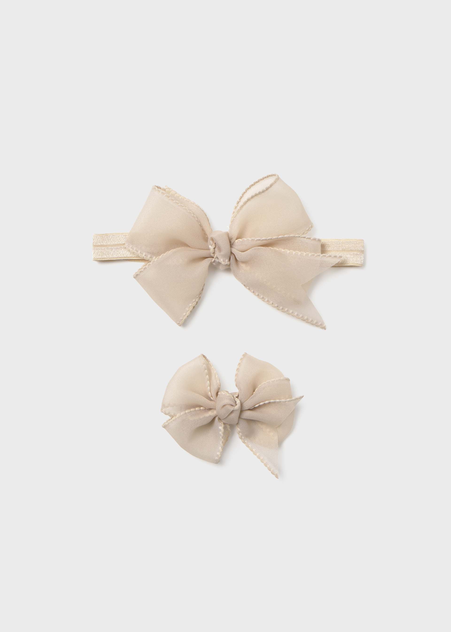 Cerchietto elasticizzato con fermaglio fiocco neonata
