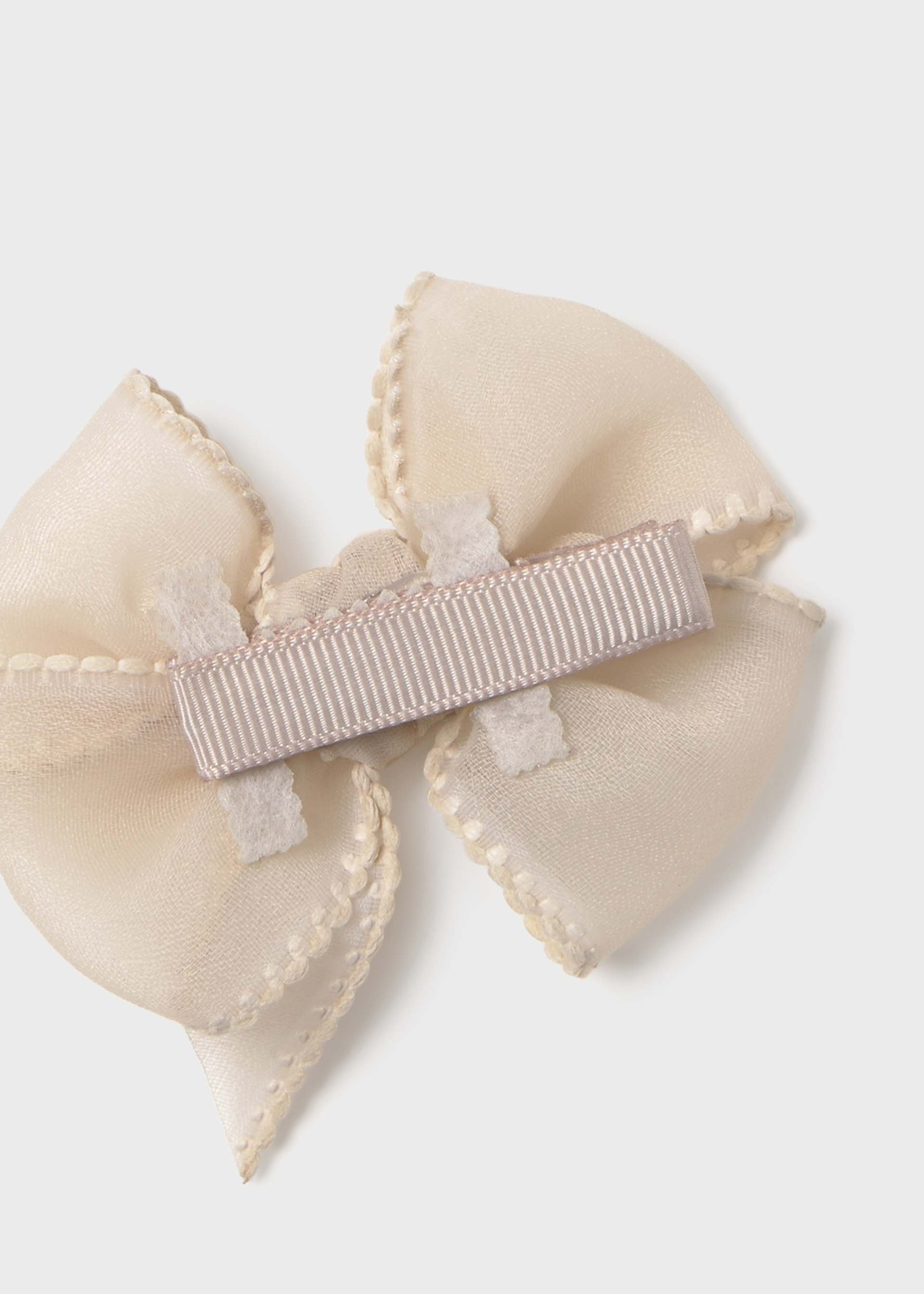 Cerchietto elasticizzato con fermaglio fiocco neonata