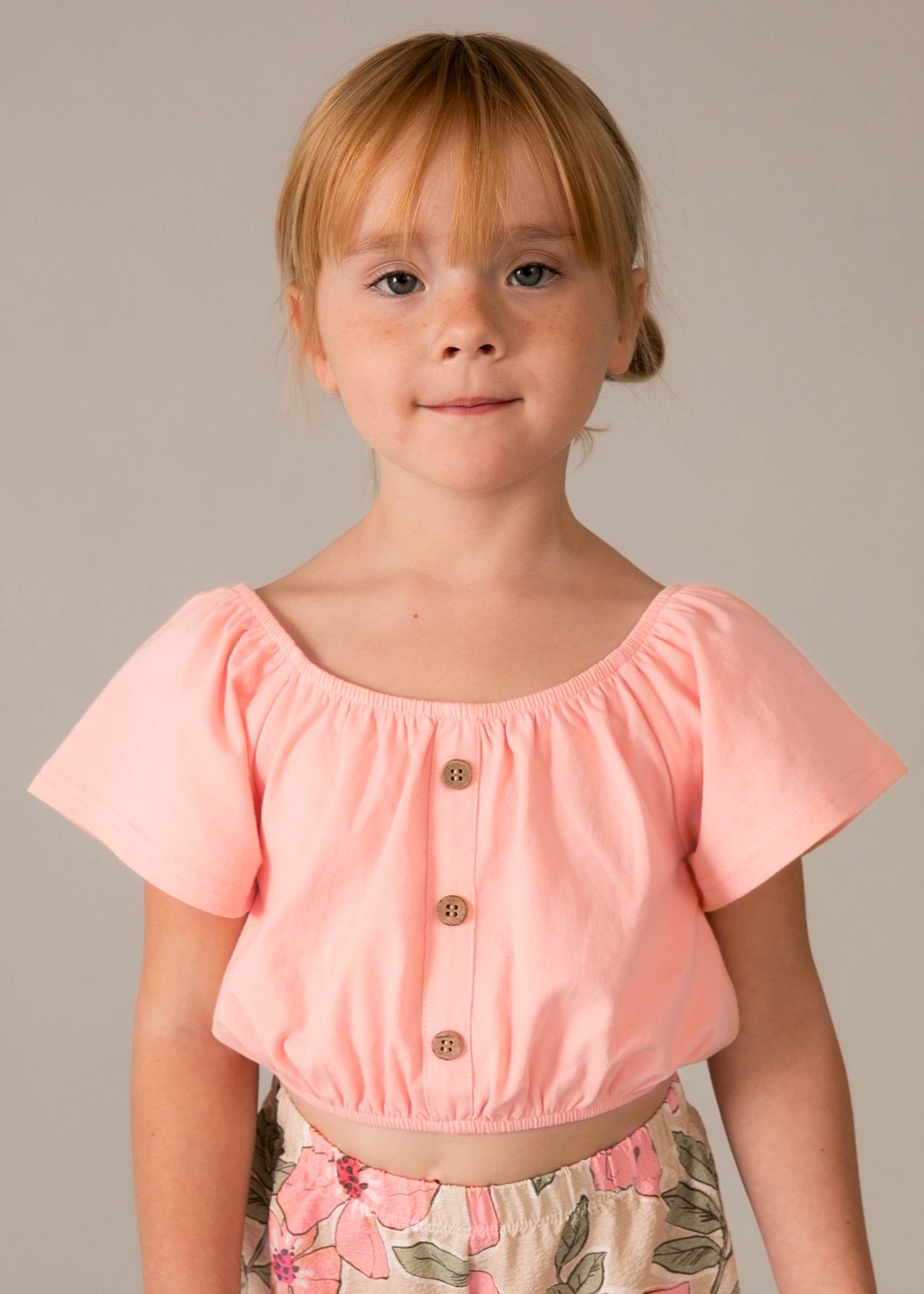 Completo pantalone stampato e top bambina