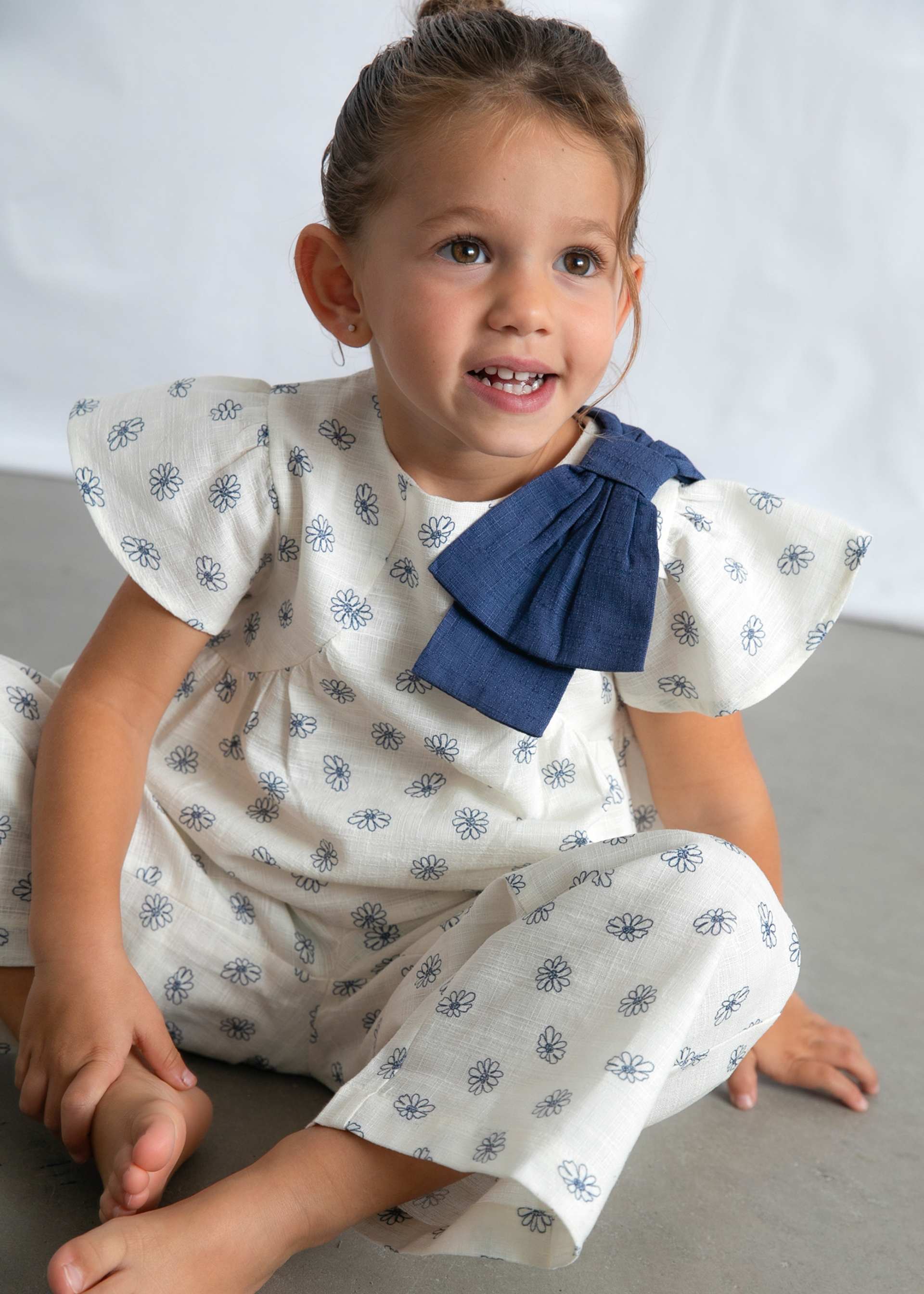 Conjunto pantalón largo y top estampado niña