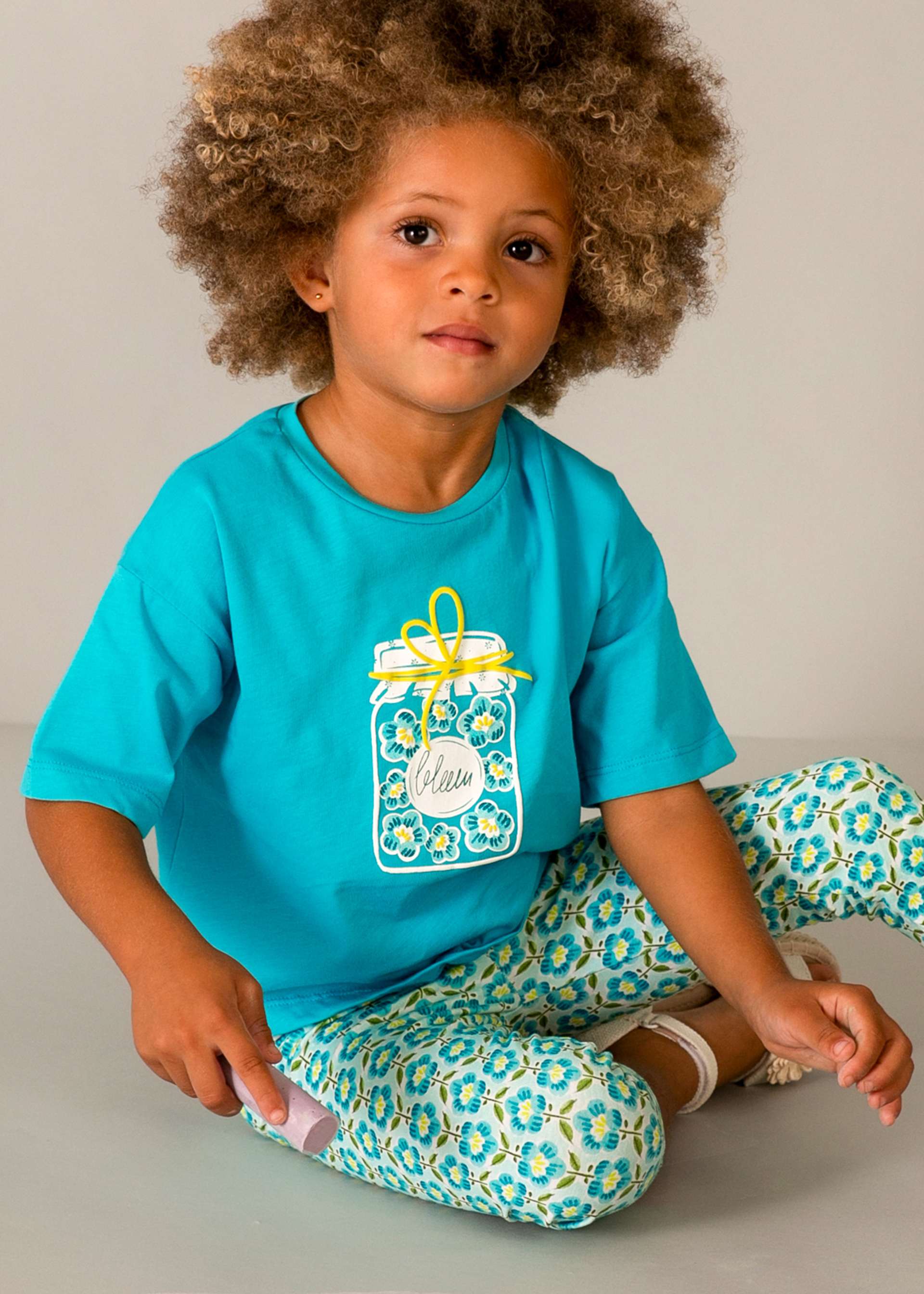 Playera hombro caído niña