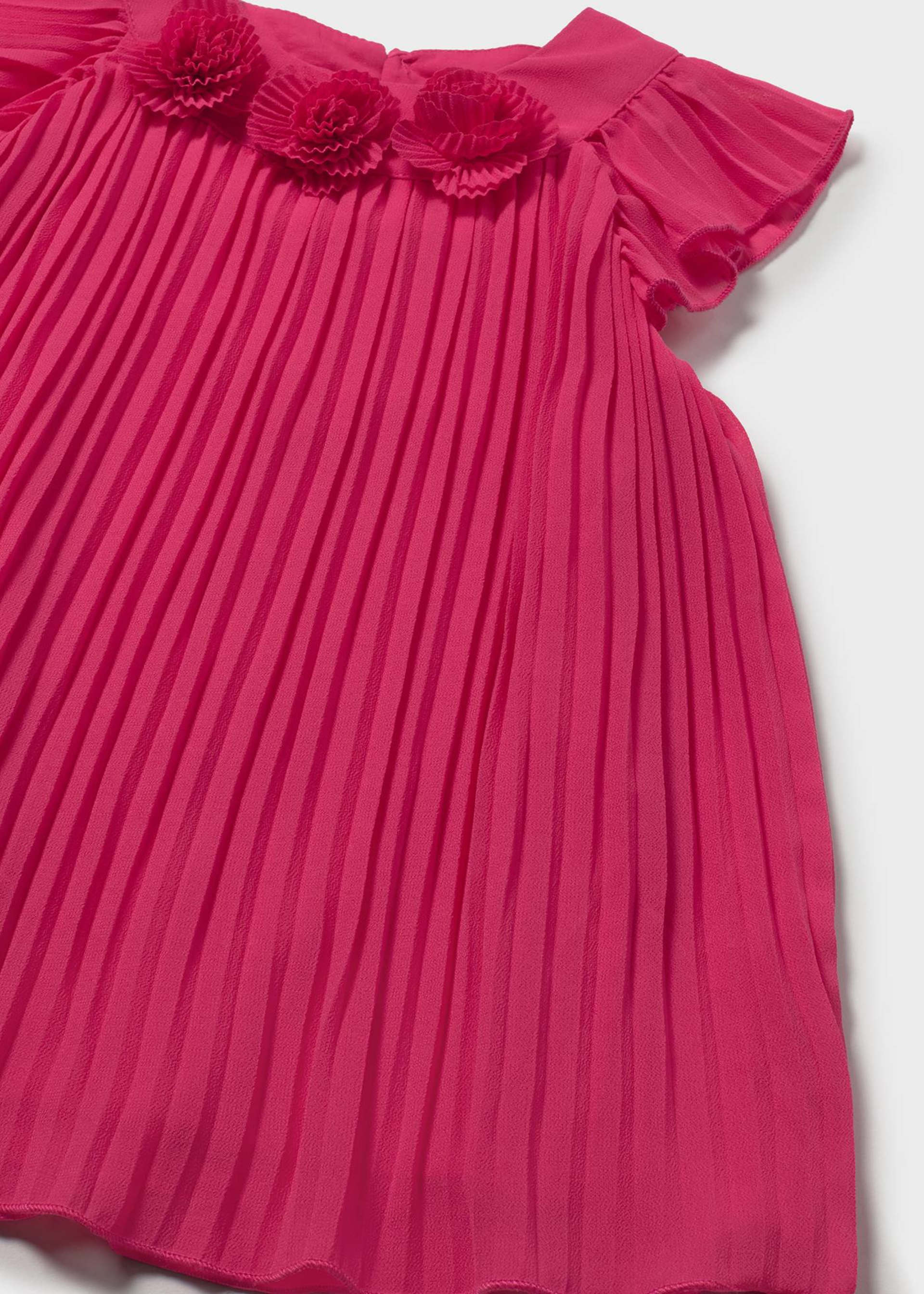 Vestito plissettato con fiori neonata