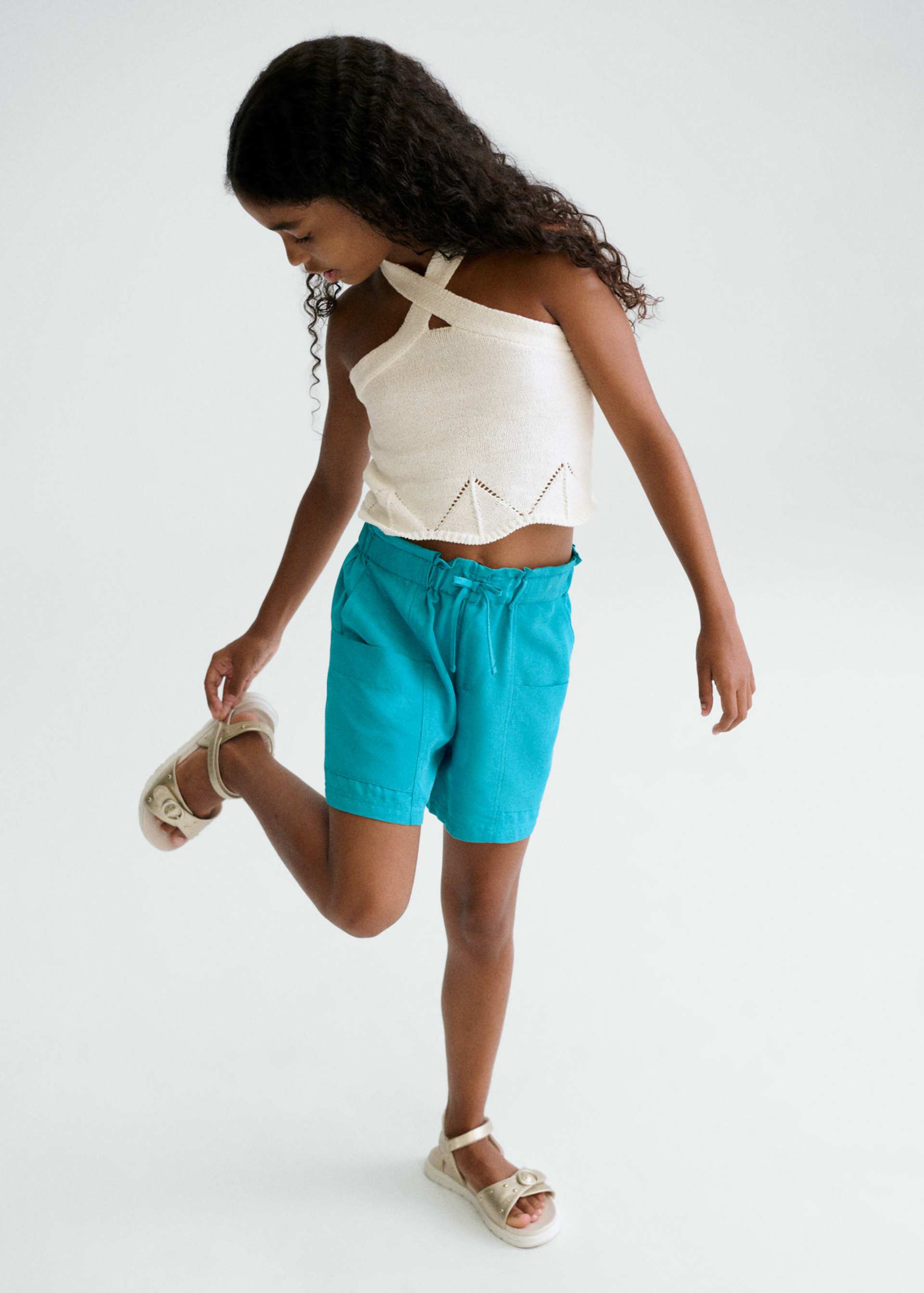 Pantalón corto bolsillos chica