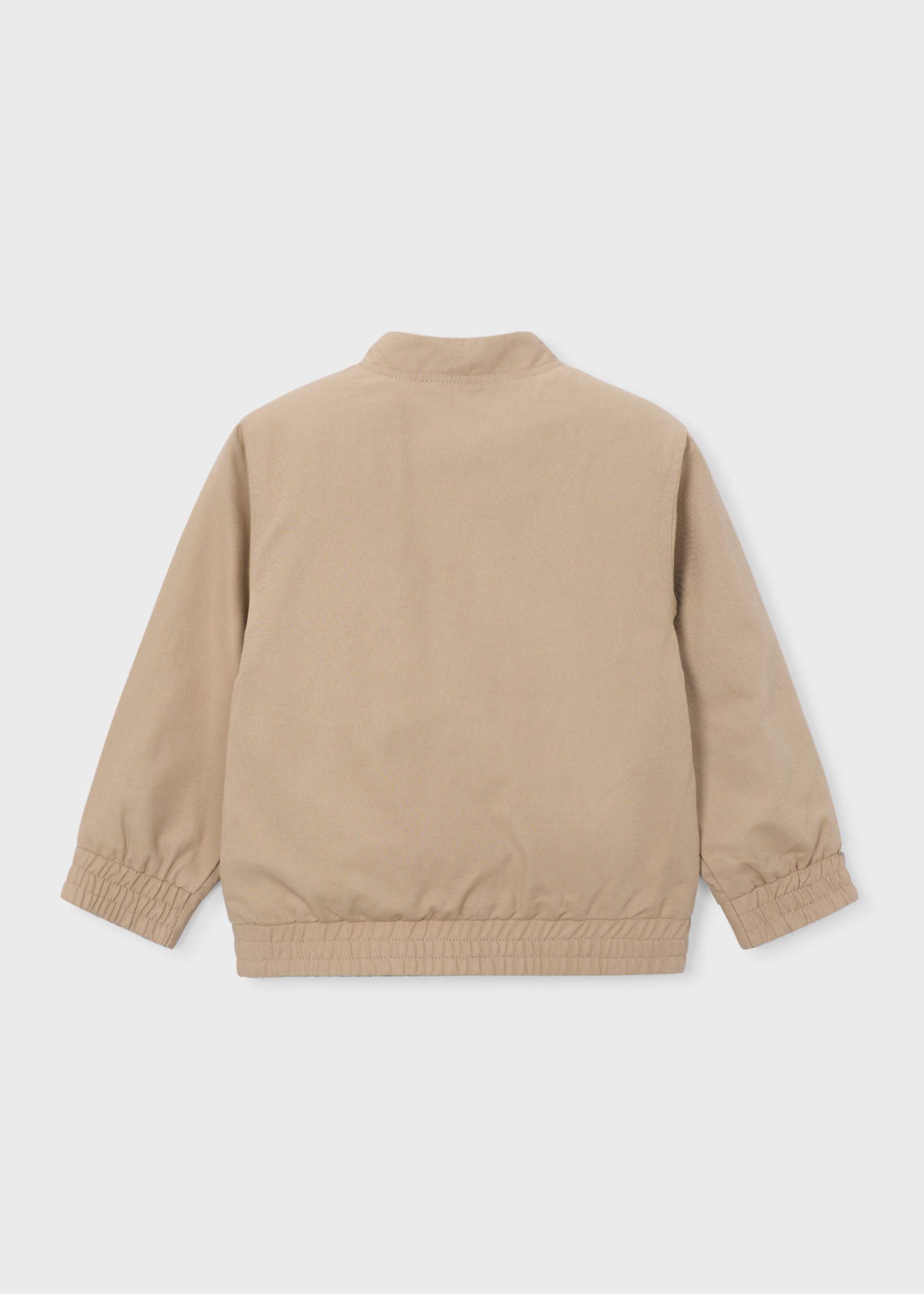 Cazadora reversible bolsillos niño