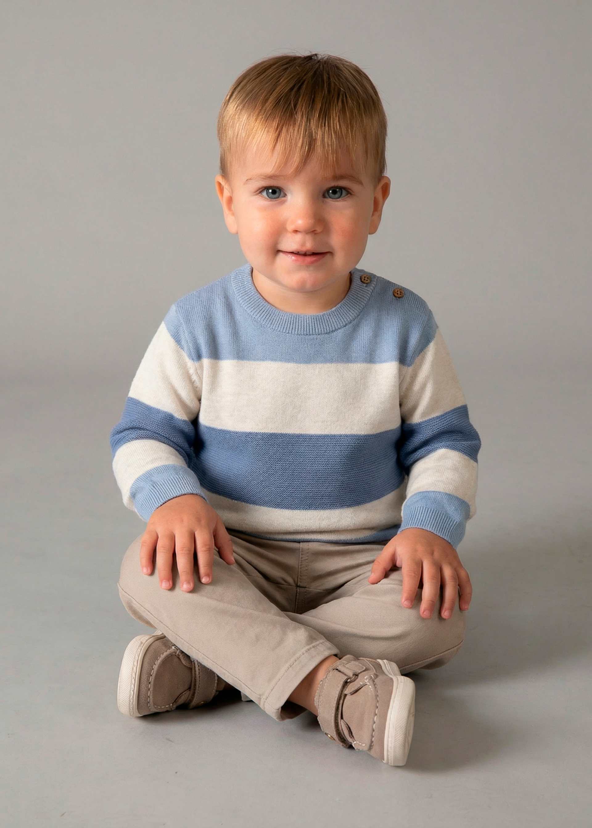 Baby knitted jumper with stripes