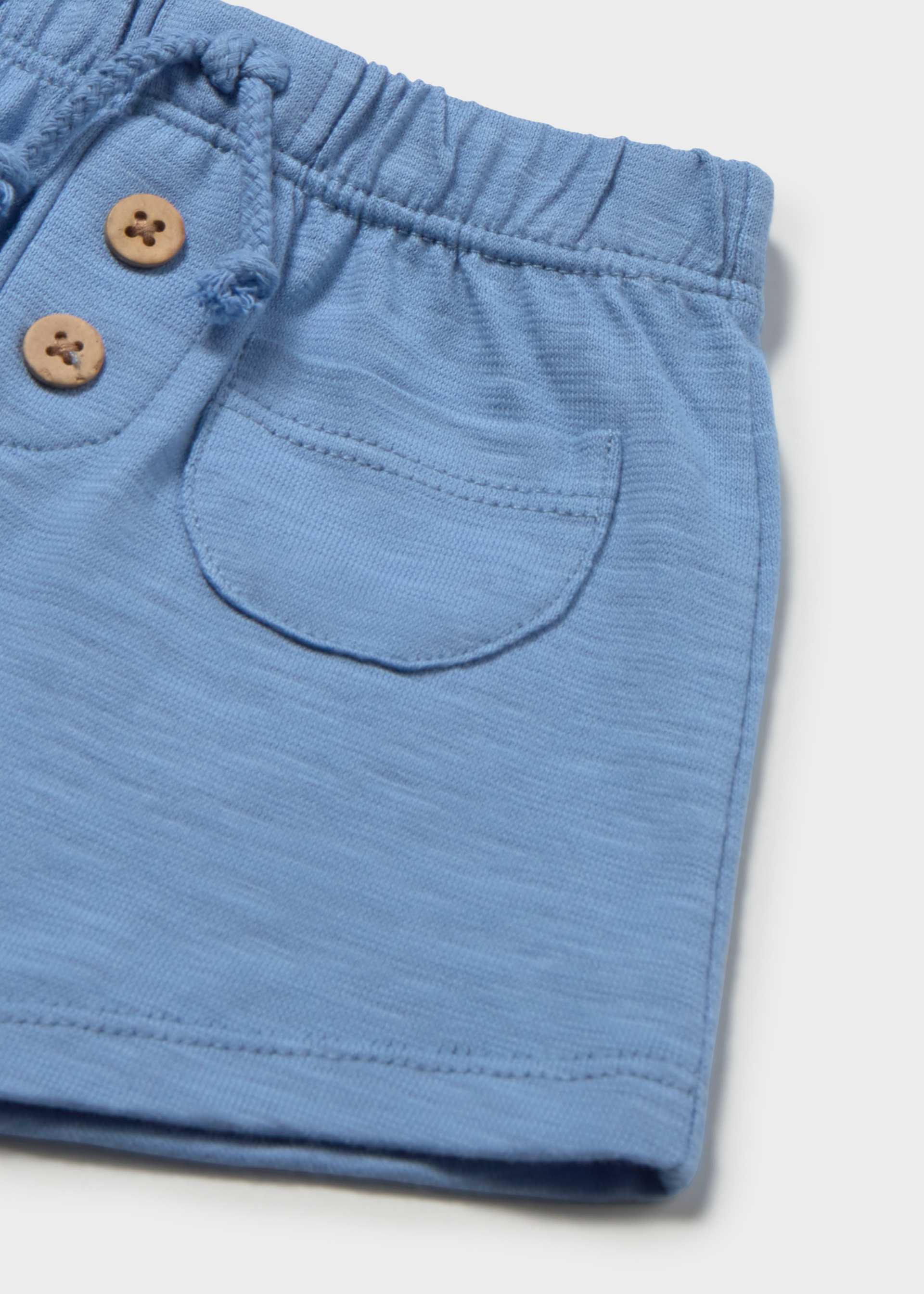 Short punto bolsillos recién nacido