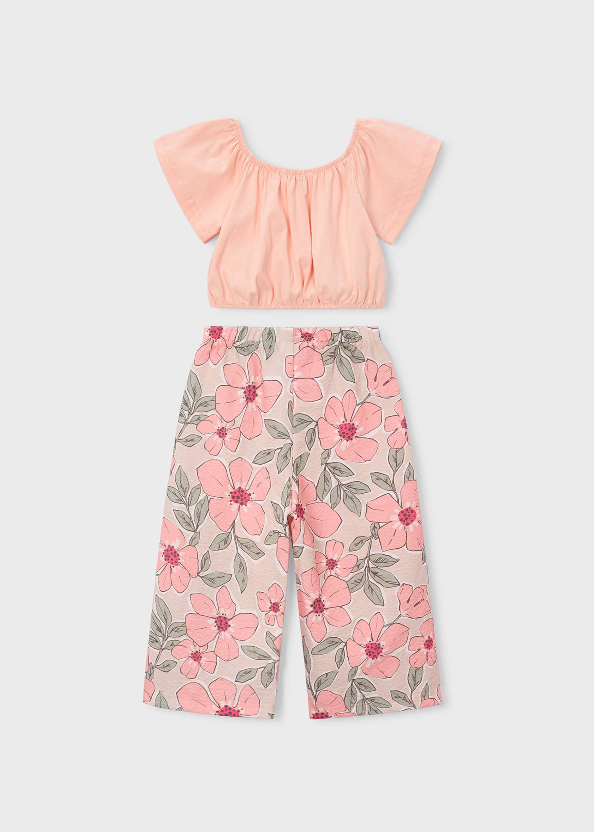 Conjunto pantalón largo estampado y top niña