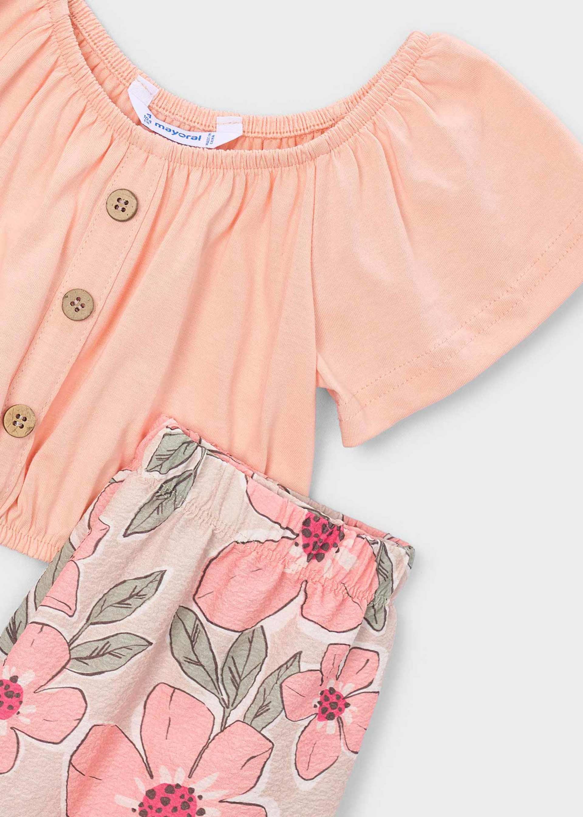 Conjunto calças estampado e top menina