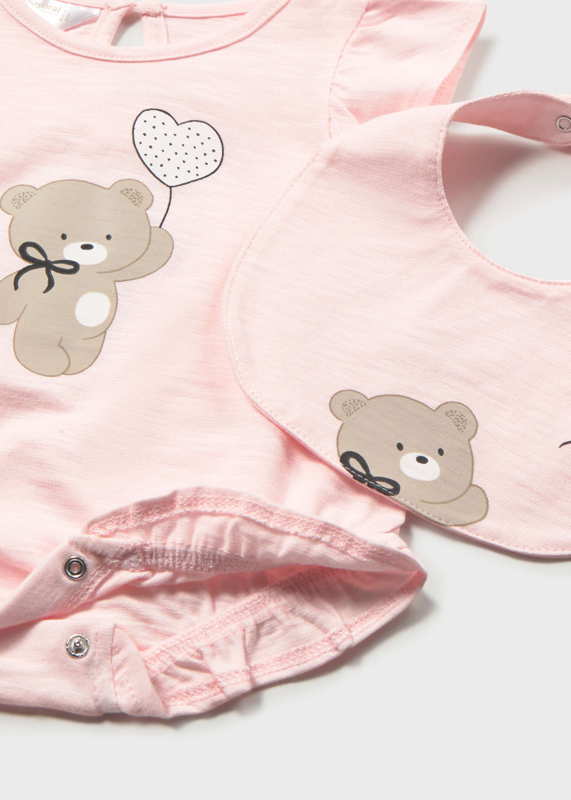 Pyjama court à volants avec bavoir nouveau-né