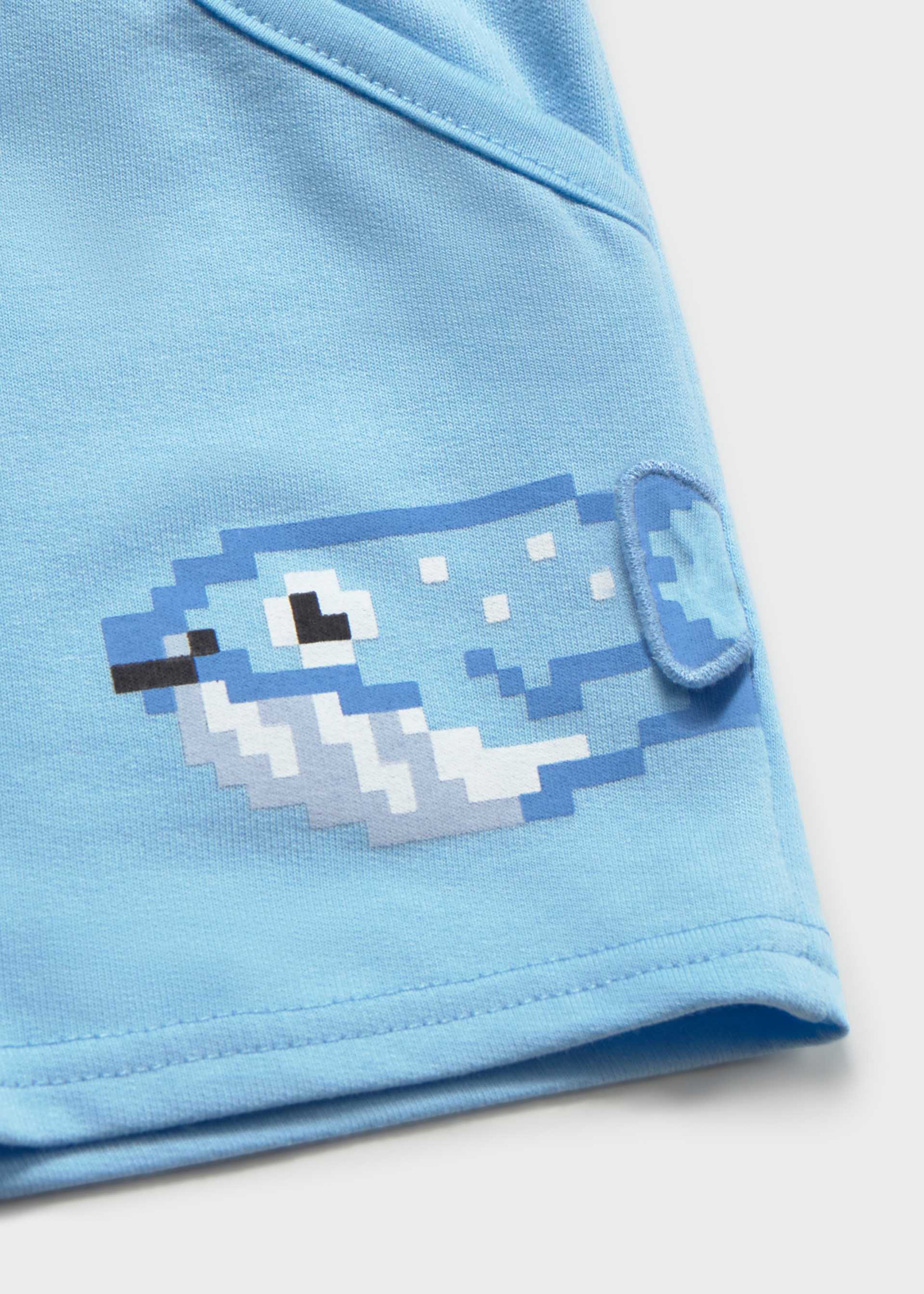 Bermuda in tuta interattiva neonato
