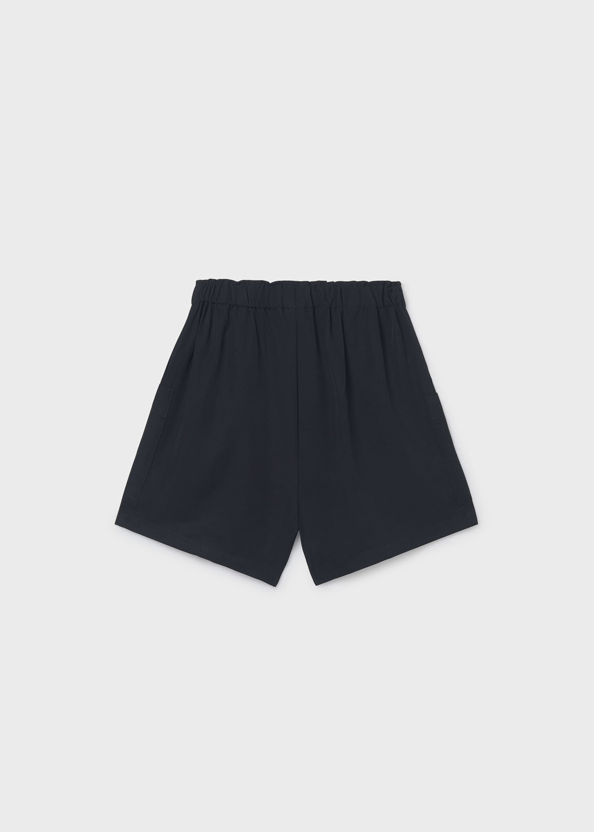 Pantalón corto bolsillos chica