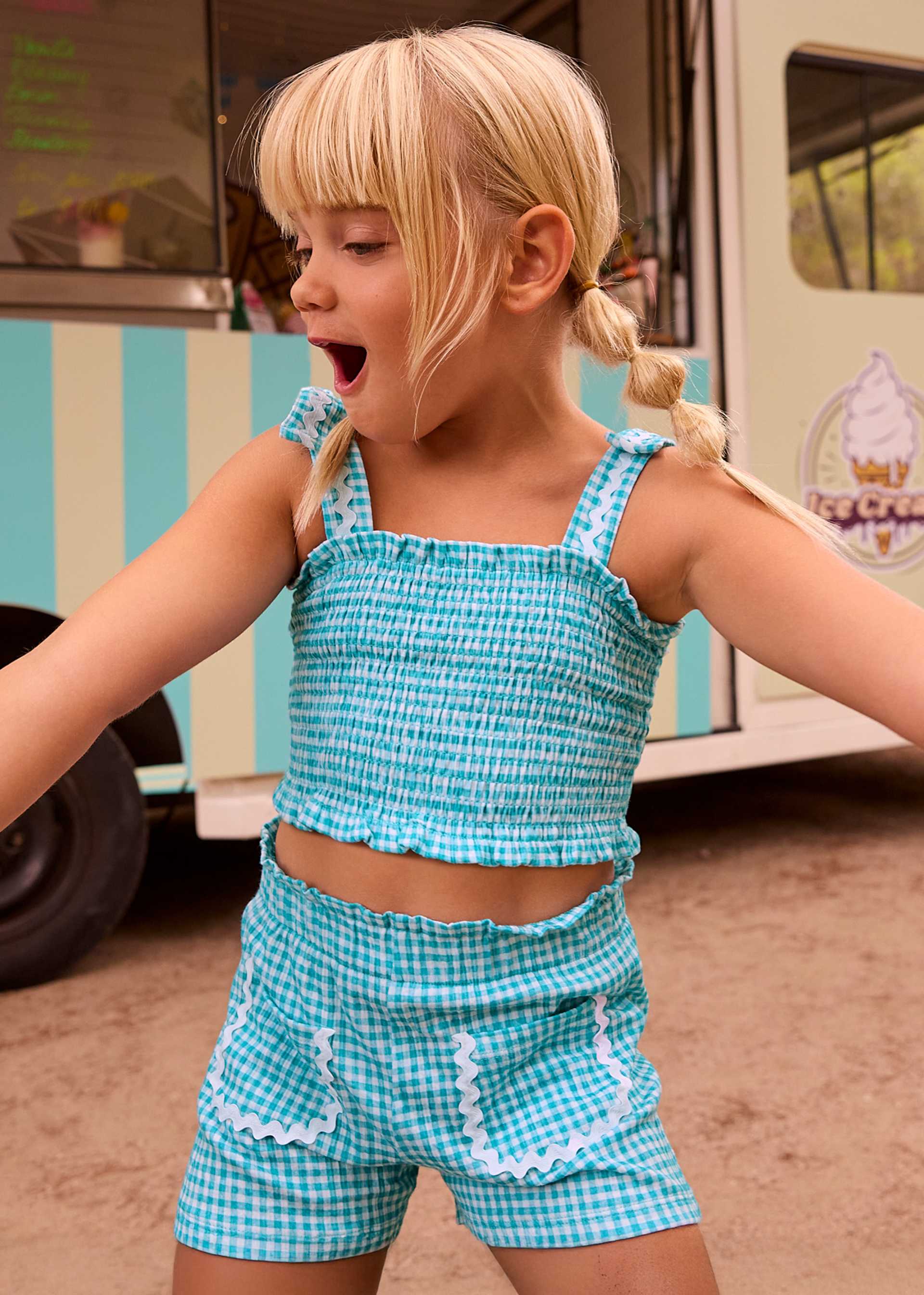 Conjunto calção e top ninho de abelha menina